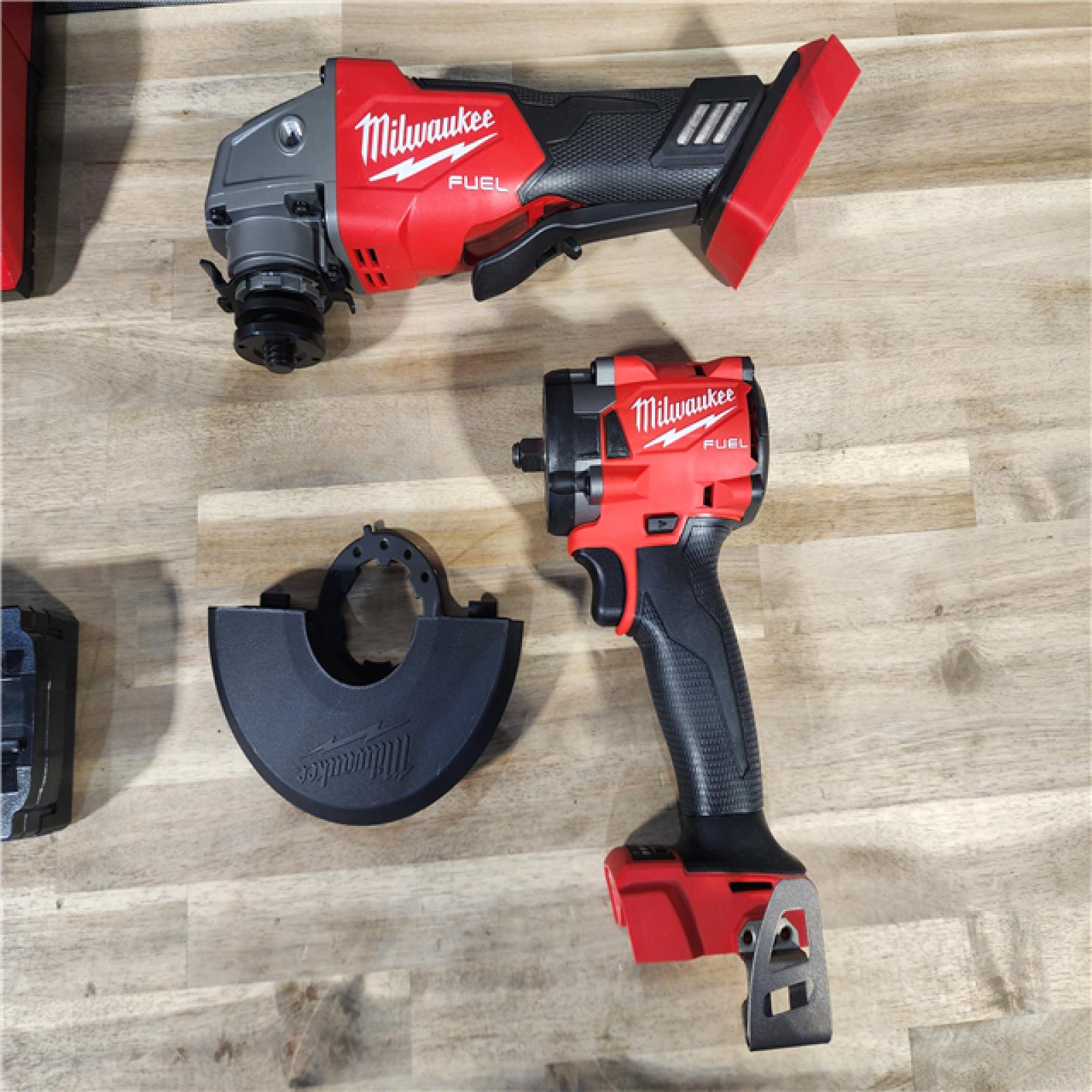 HOUSTON LOCATION - AS-IS M18 FUEL 18V Lithium-Ion Brushless Cordless Grinder & 3/8 in. Impact Wrench Combo Kit (2-Tool) W/ Two 5Ah Batteries