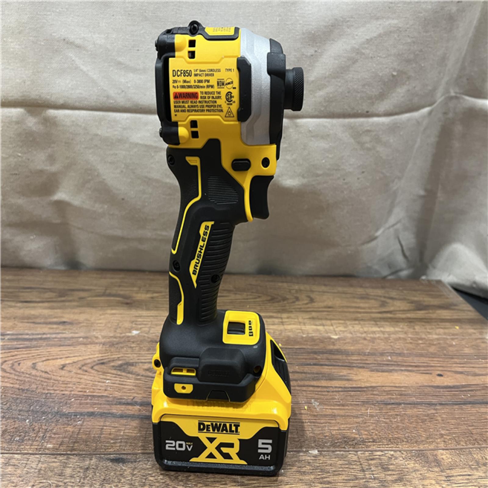 AS-IS DEWALT ATOMIC 20V MAX Lithium-Ion Cordless 1/4 in. Brushless Impact Driver Kit, 5 Ah Battery, Charger, and Bag