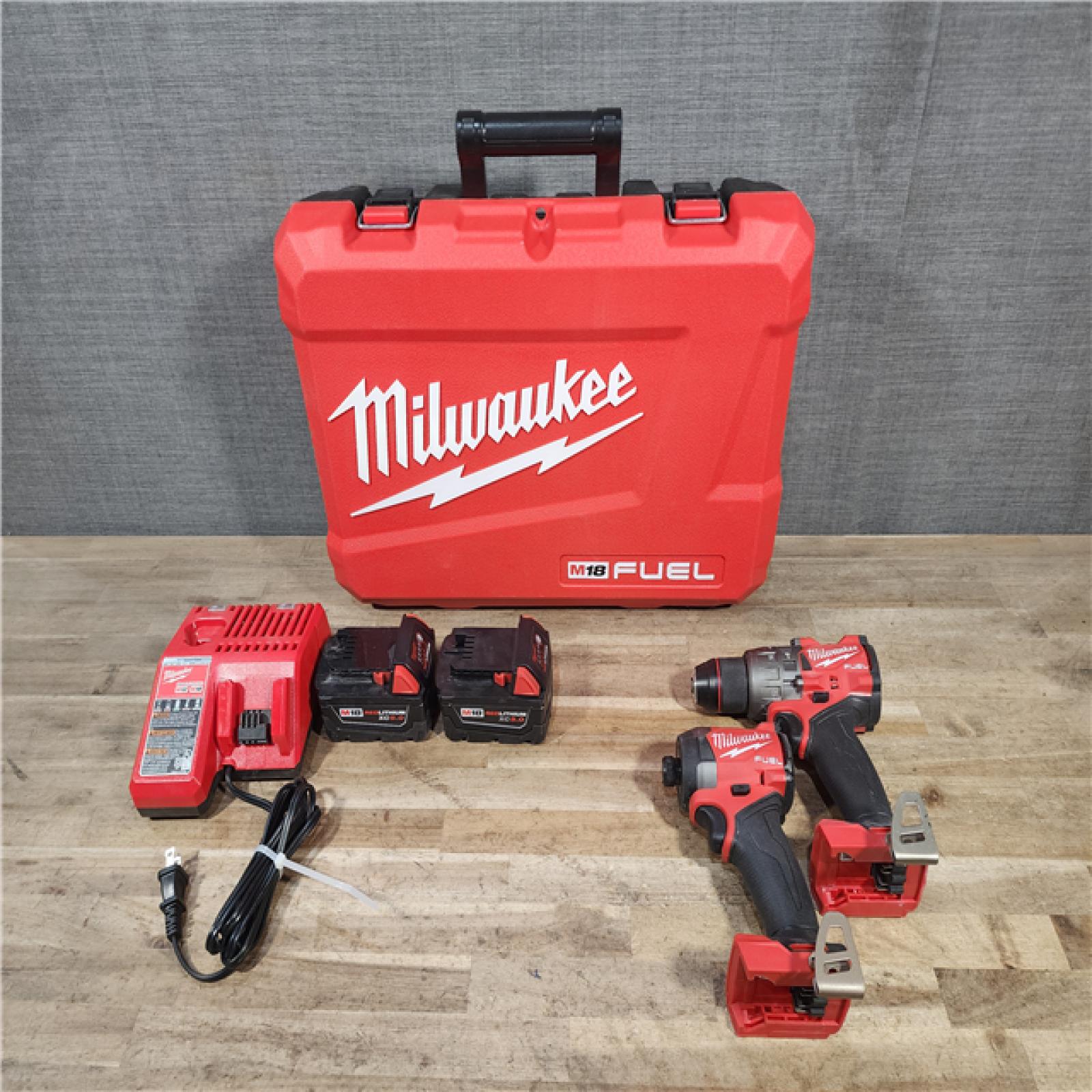 HOUSTON LOCATION - AS-IS Milwaukee FUEL 18V Lithium-Ion Brushless Cordless Hammer Drill and Impact Driver Combo Kit
