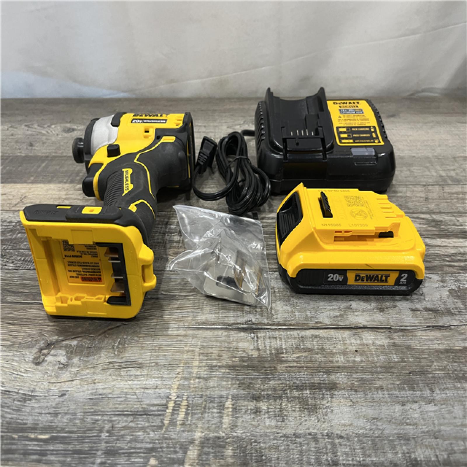 AS-IS DEWALT Atomic 20V Max Lithium-Ion Brushless Cordless Compact 1/4 in. Impact Driver Kit