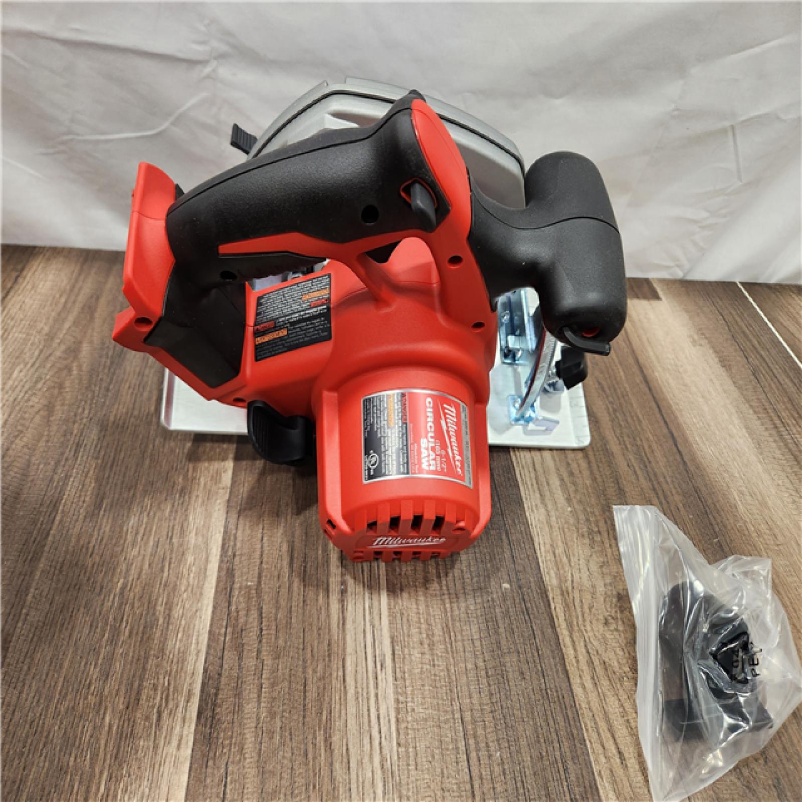 AS-IS Milwaukee M18 18V Lithium-Ion Cordless 6-1/2 in. Circular Saw (Tool-Only)