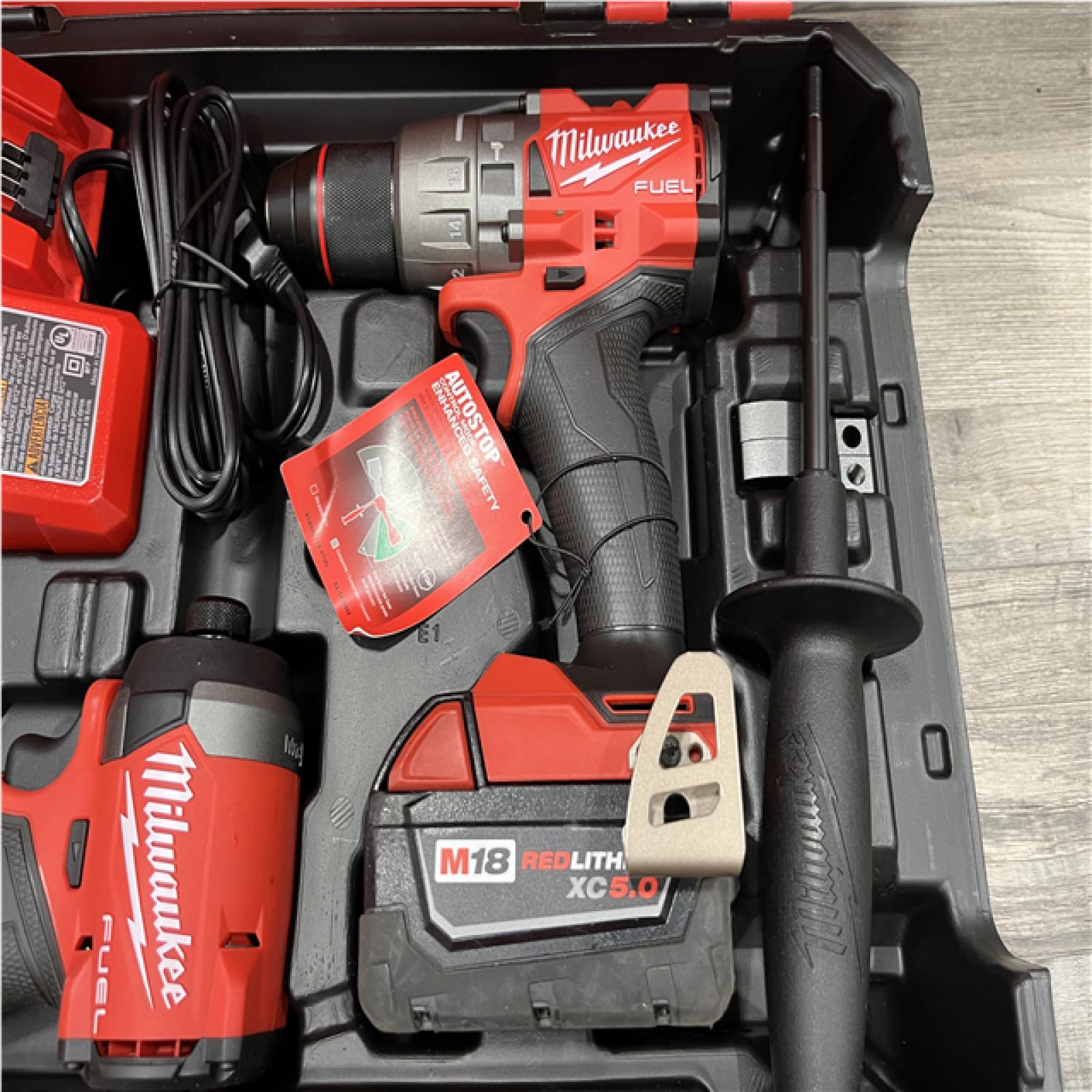AS-IS Milwaukee FUEL 18V Lithium-Ion Brushless Cordless Hammer Drill and Impact Driver Combo Kit