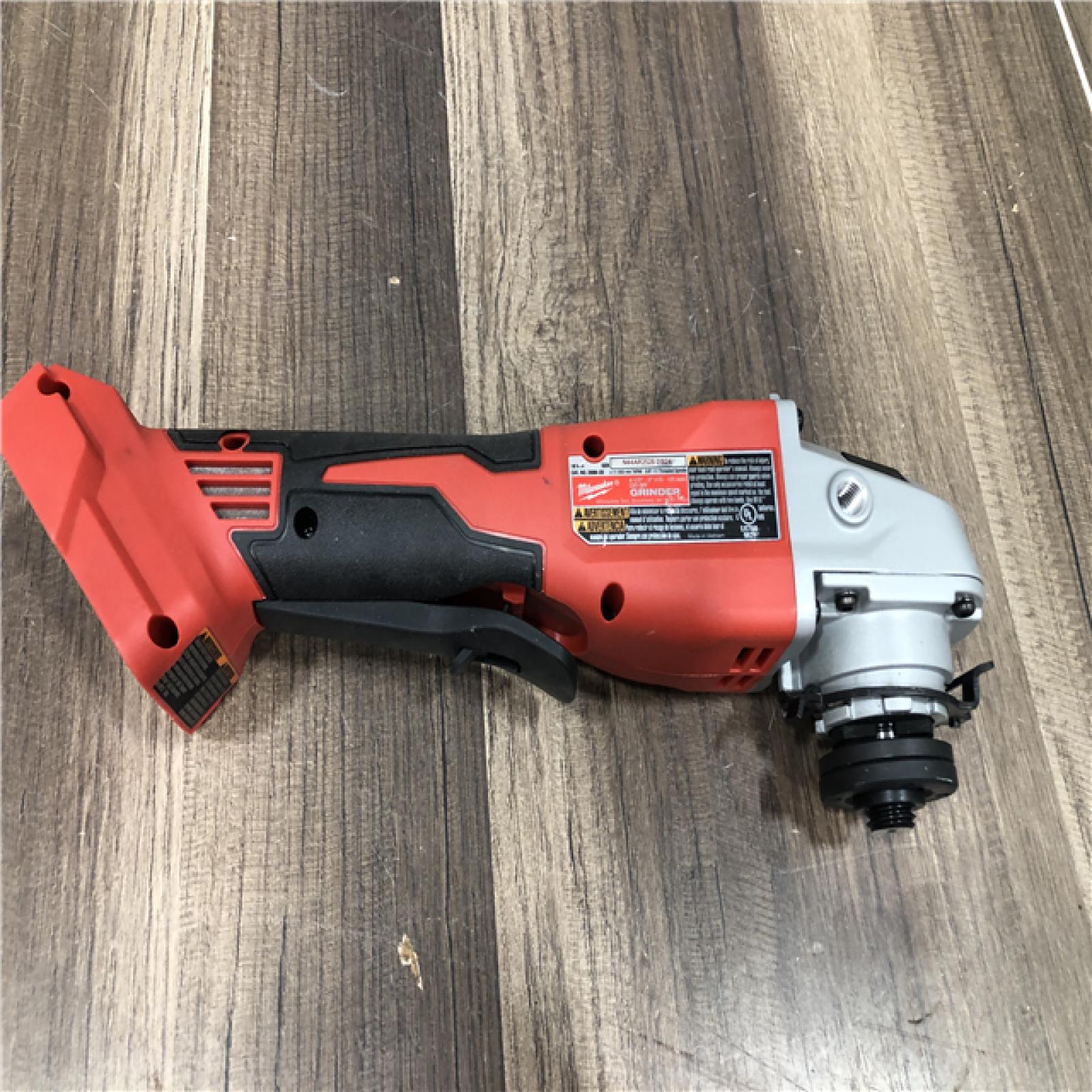 AS-IS Milwaukee 18V Lithium-Ion Brushless Cordless 4-1/2 in./5 in. Grinder w/Paddle Switch (Tool-Only)