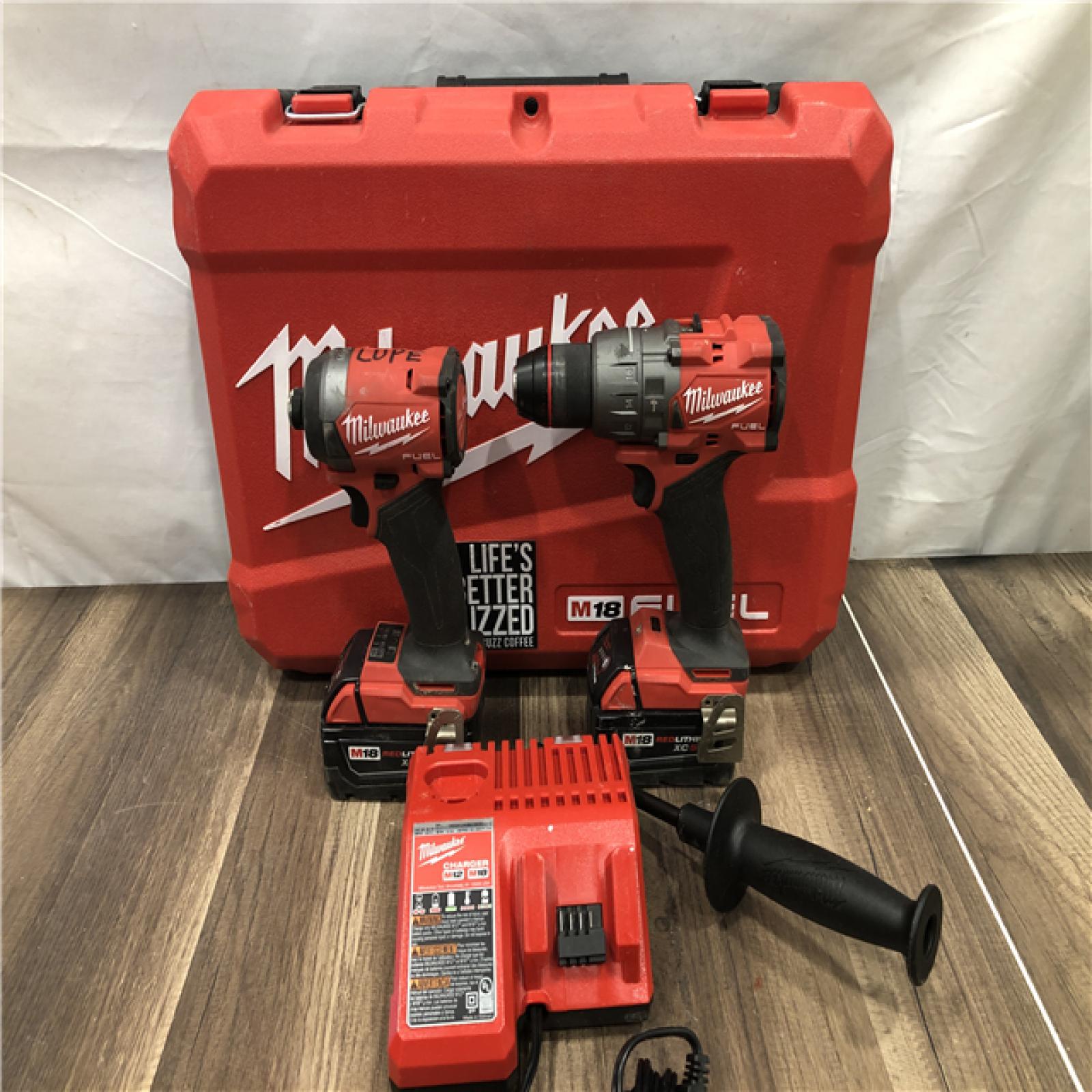 AS-IS Milwaukee FUEL 18V Lithium-Ion Brushless Cordless Hammer Drill and Impact Driver Combo Kit