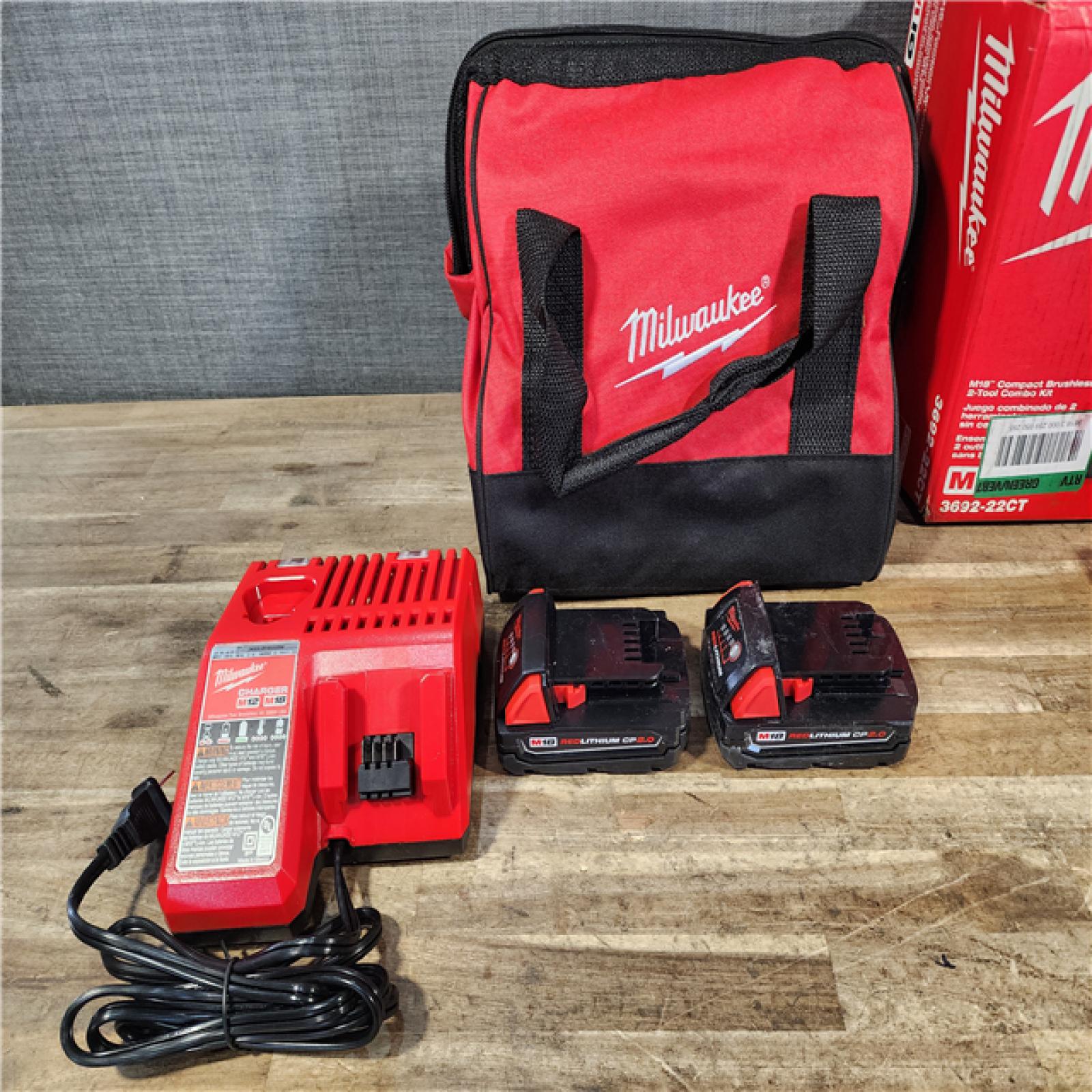 HOUSTON LOCATION - AS-IS Milwaukee M18 18V Lithium-Ion Brushless Cordless Compact Drill/Impact Combo Kit (2-Tool) W/(2) 2.0 Ah Batteries  Charger & Bag