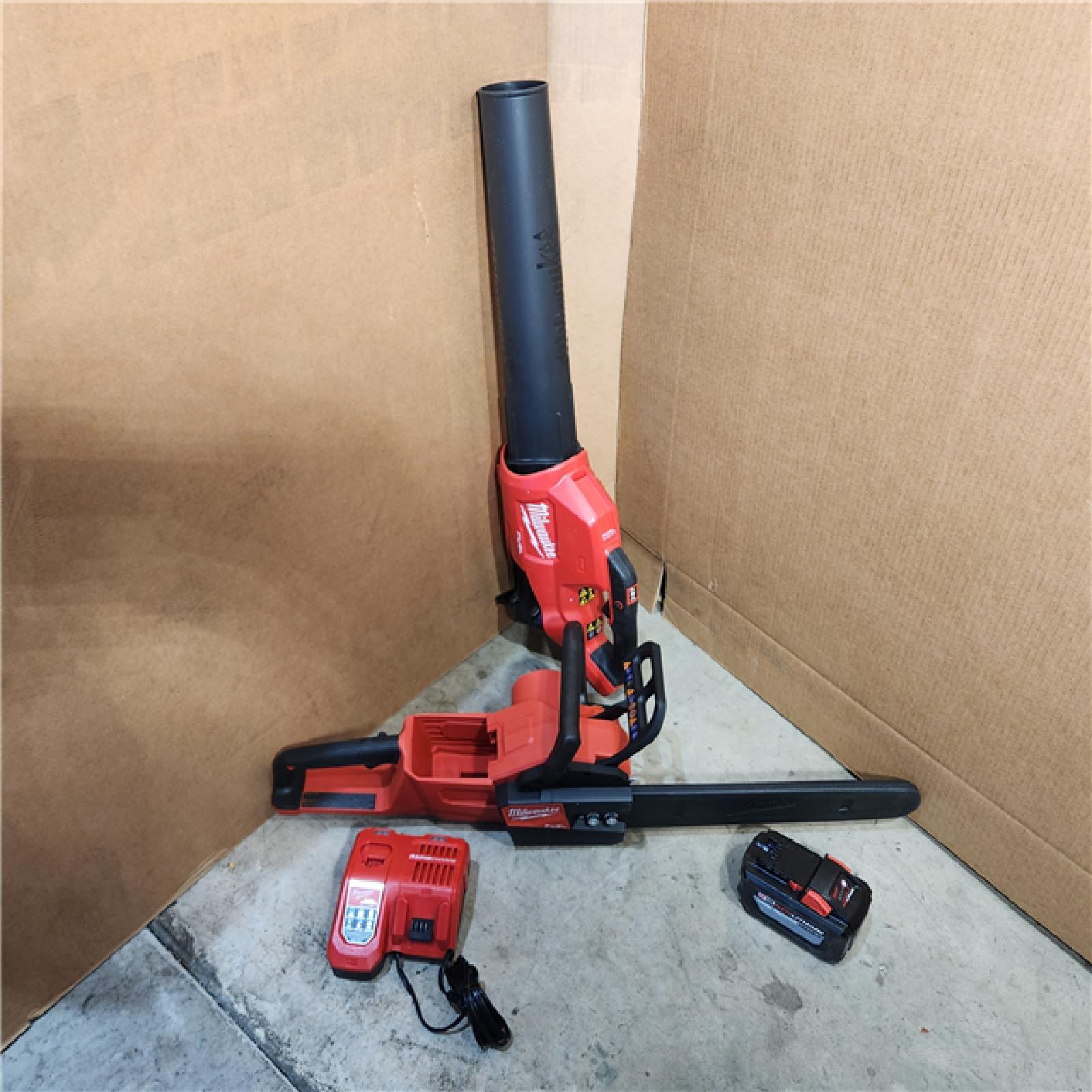 HOUSTON Location-AS-IS-Milwaukee 2727-21HDP M18 18V FUEL Lithium-Ion Brushless Cordless 2-Tool Combo Kit with 16 Chainsaw and Handheld Blower 12.0 Ah APPEARS IN NEW Condition