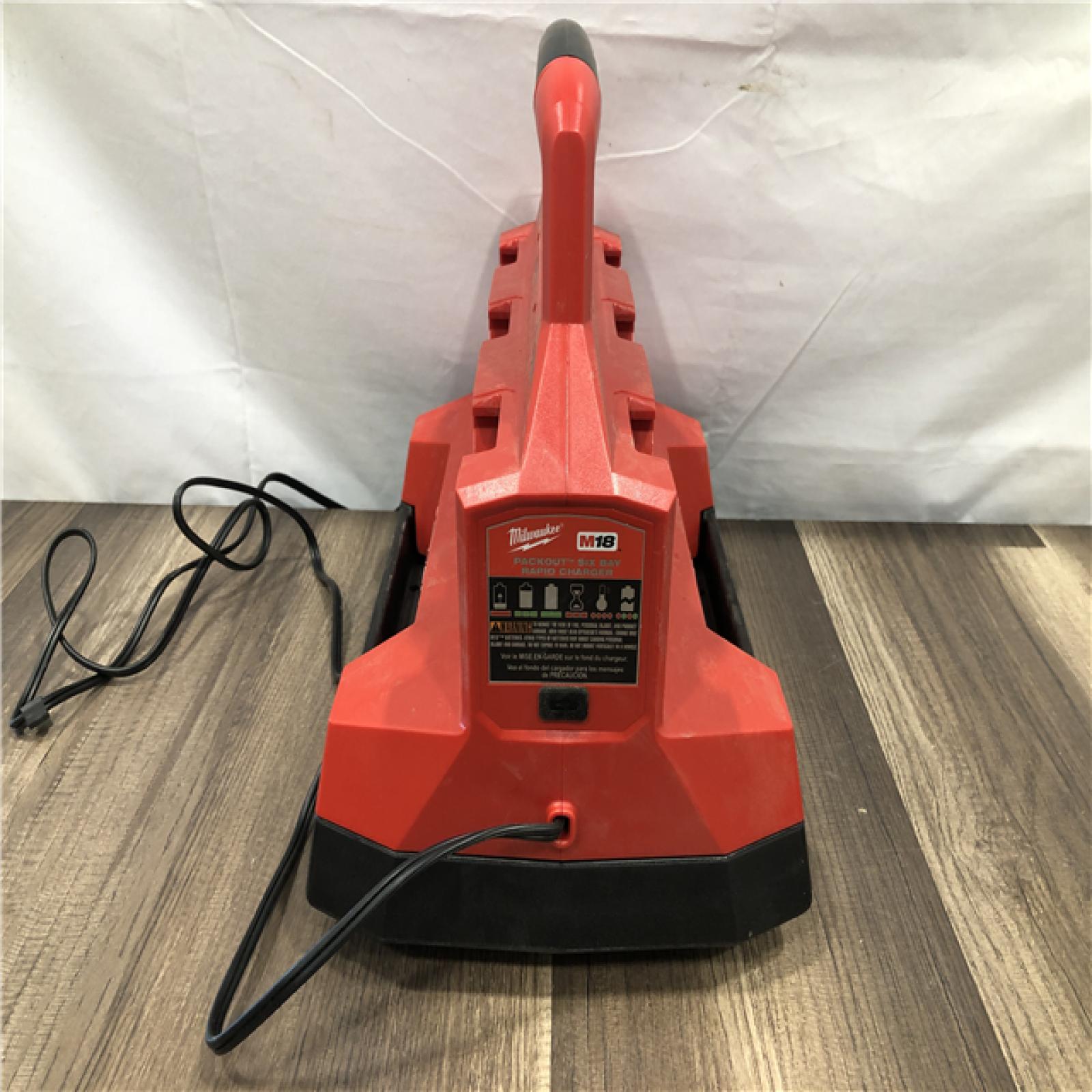 AS-IS Milwaukee 18-Volt Lithium-Ion Battery Pack (2) 5.0Ah and High Output Battery Pack (2) 6.0Ah with PACKOUT 6-Port Rapid Charger