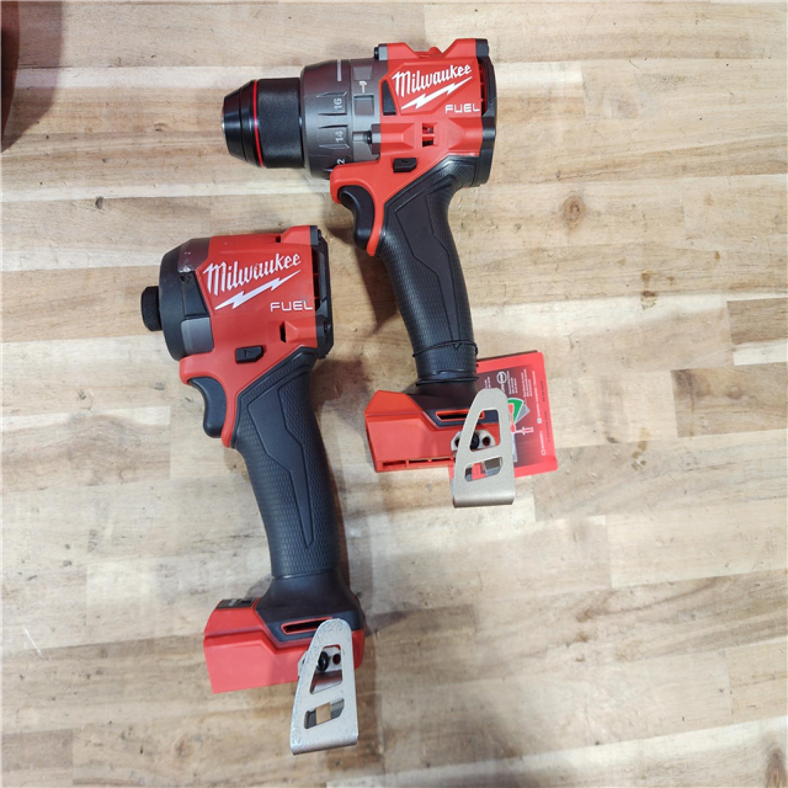 HOUSTON LOCATION - AS-IS Milwaukee FUEL 18V Lithium-Ion Brushless Cordless Hammer Drill and Impact Driver Combo Kit