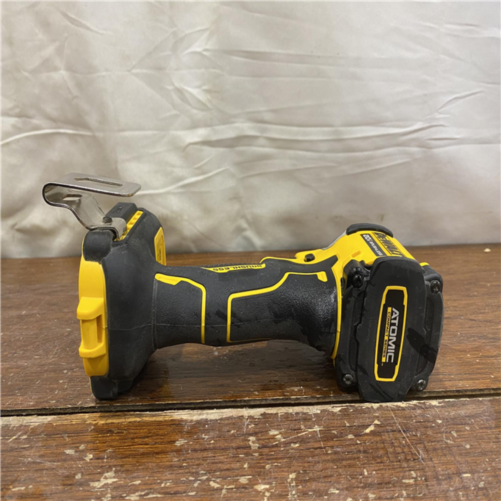 AS-IS DEWALT ATOMIC 20V MAX Lithium-Ion Cordless 1/4 in. Brushless Impact Driver Kit, 5 Ah Battery, Charger, and Bag