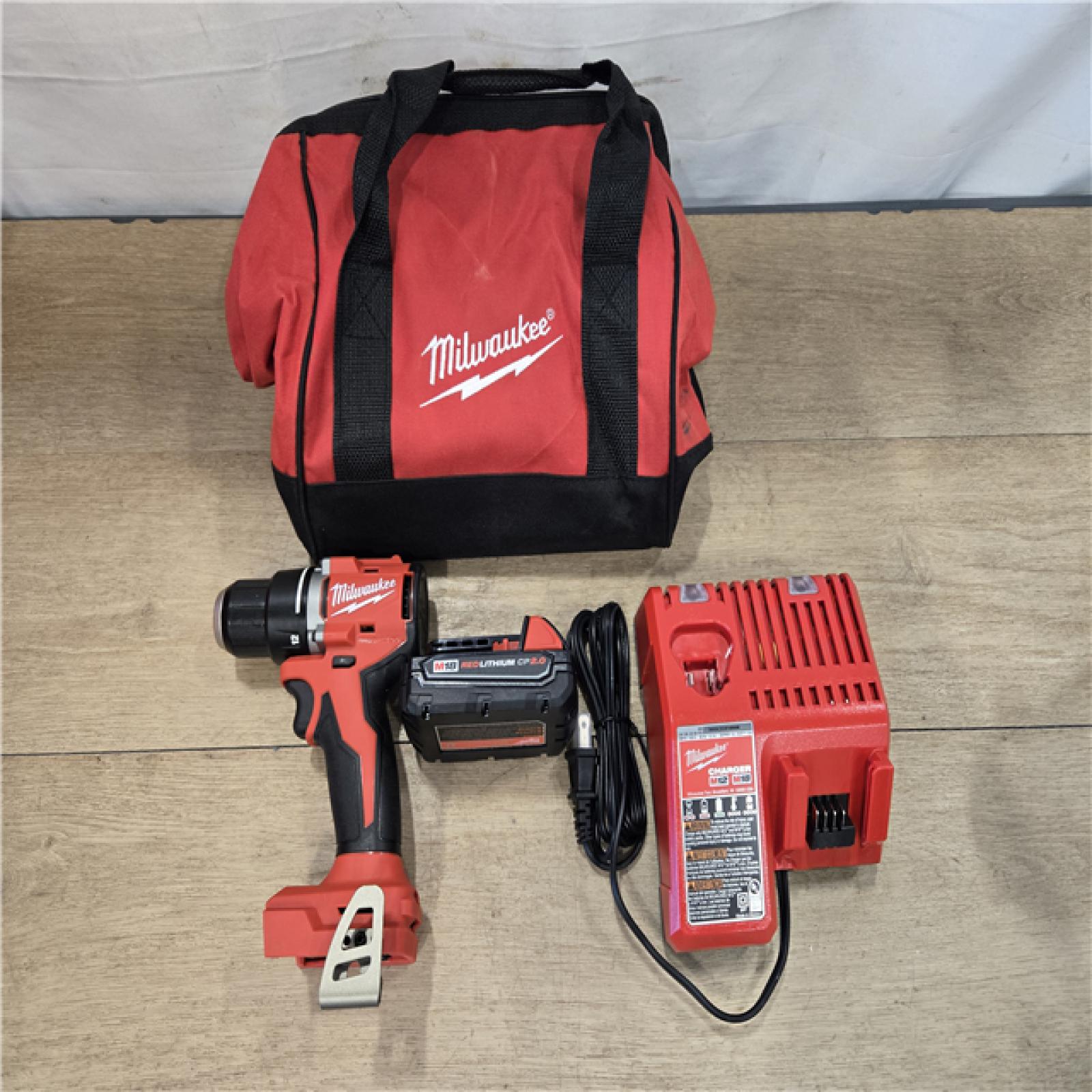 AS-IS Milwaukee 18V Lithium-Ion Brushless Cordless 1/2 in. Compact Drill/Driver with kit