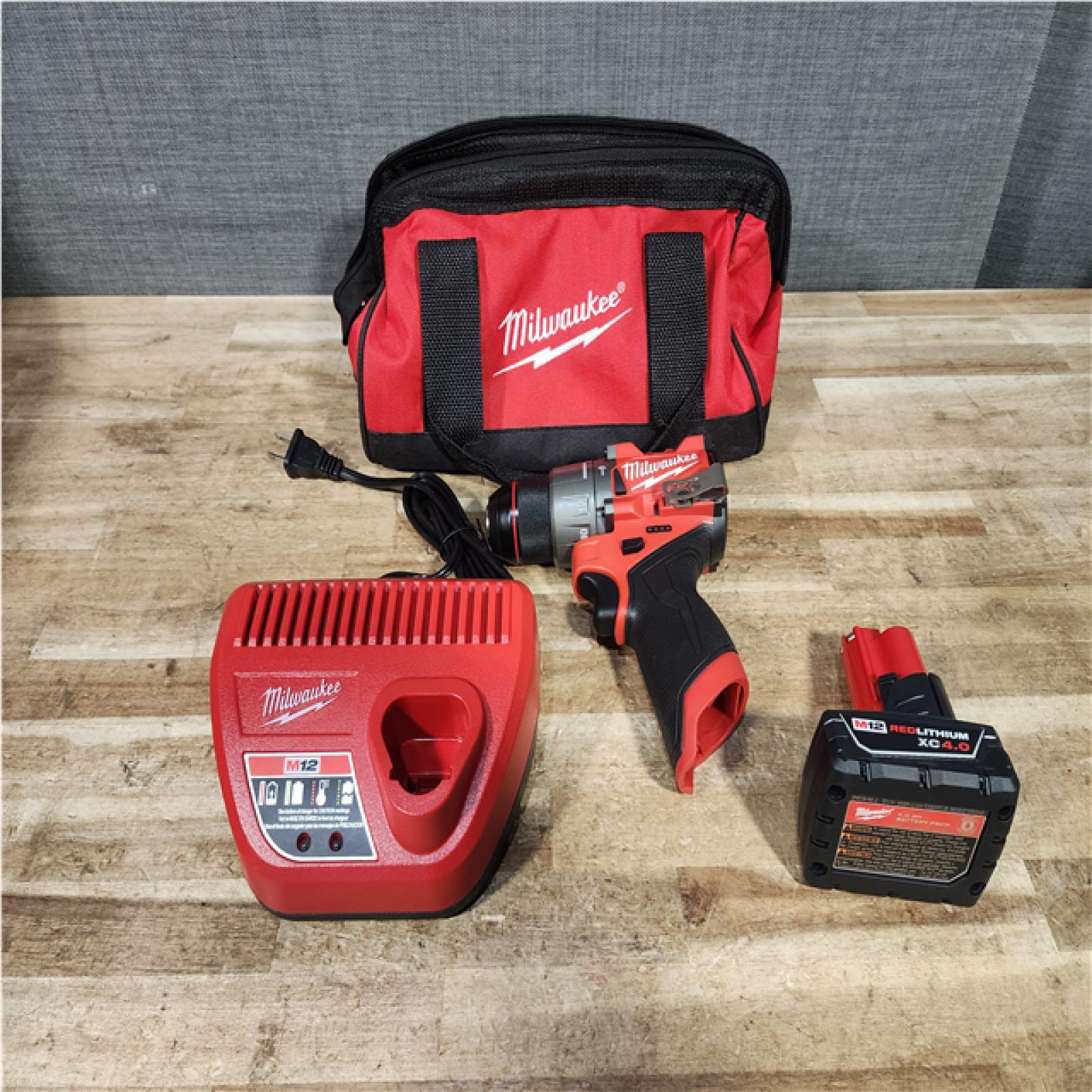 Houston Location AS-IS Milwaukee FUEL Drill and Battery and Charger