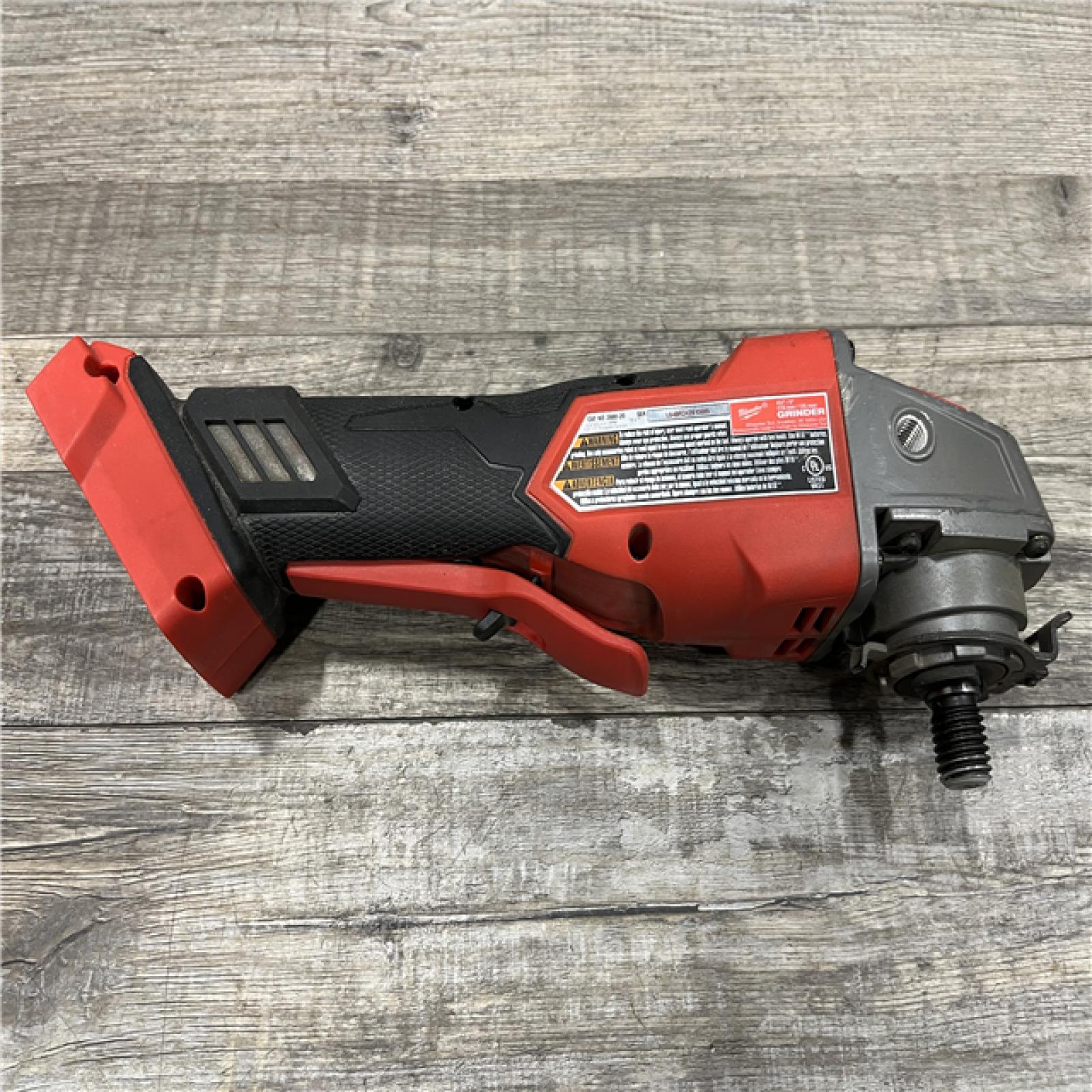 AS-IS Milwaukee FUEL 18V Lithium-Ion Brushless Cordless 4-1/2 in./5 in. Grinder w/Paddle Switch (Tool-Only)