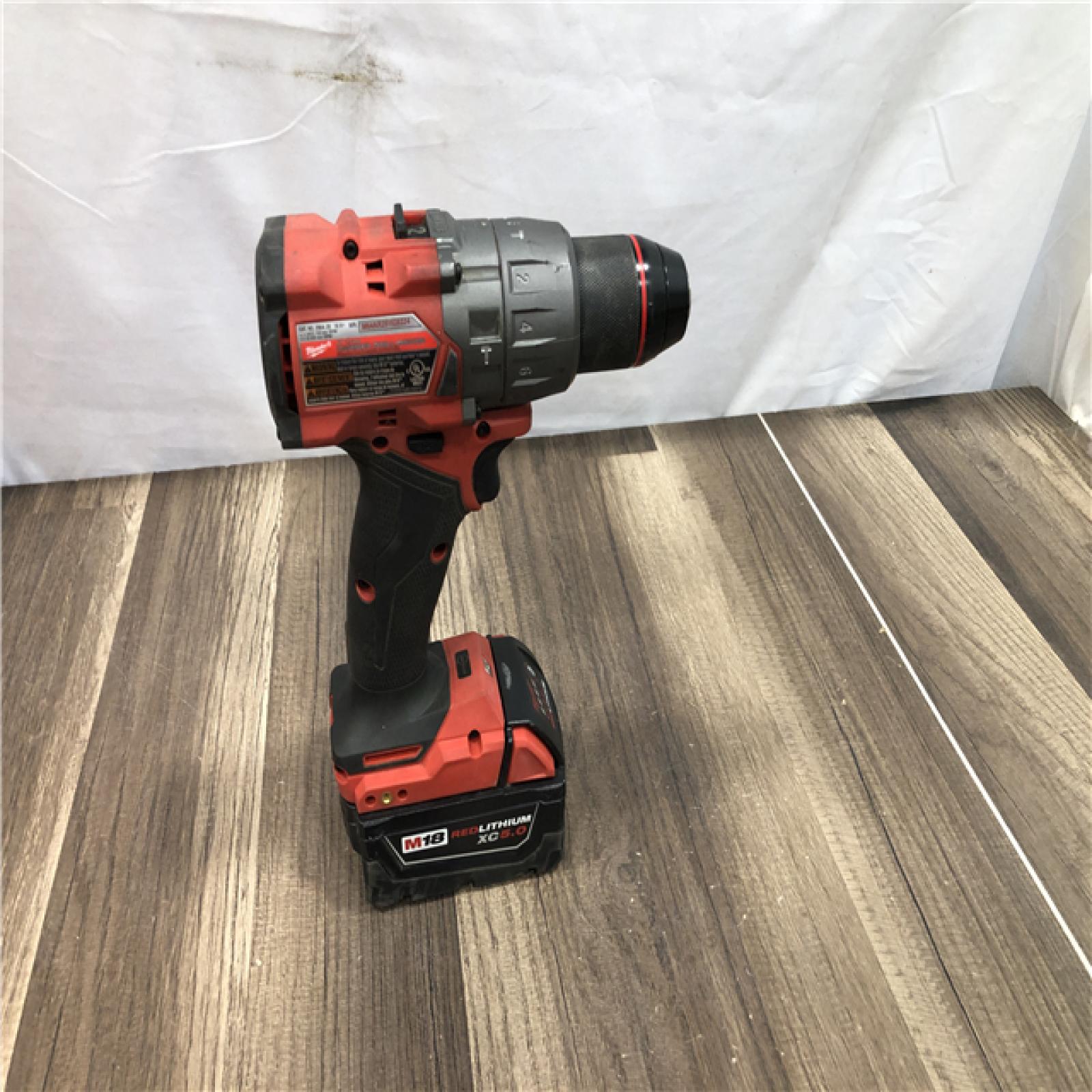 AS-IS Milwaukee FUEL 18V Lithium-Ion Brushless Cordless 1/2 in. Hammer Drill Driver Kit