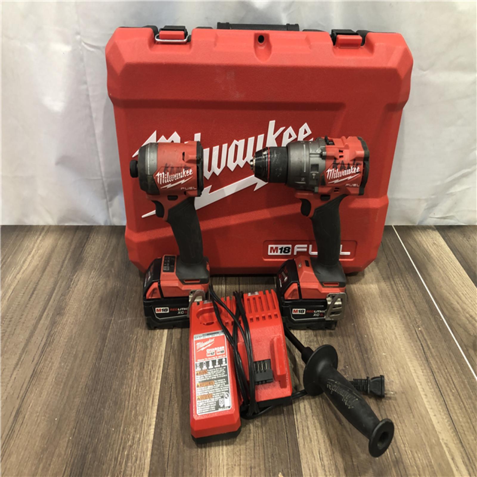 AS-IS Milwaukee  FUEL 18V Lithium-Ion Brushless Cordless Hammer Drill and Impact Driver Combo Kit