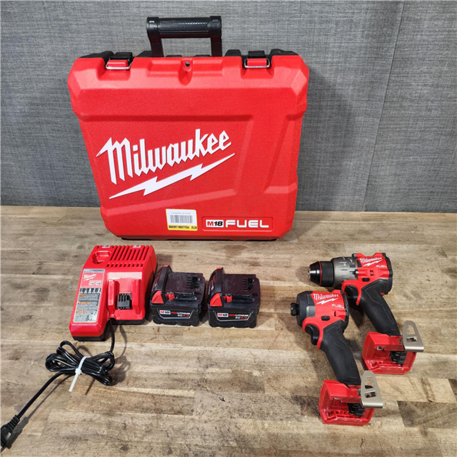 HOUSTON LOCATION - AS-IS MILWAUKEE FUEL 18V Lithium-Ion Brushless Cordless Hammer Drill and Impact Driver Combo Kit