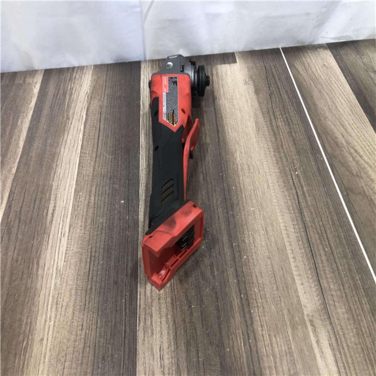 AS-IS Milwaukee FUEL 18V Lithium-Ion Brushless Cordless 4-1/2 in./5 in. Grinder with Variable Speed & Paddle Switch (Tool-Only)