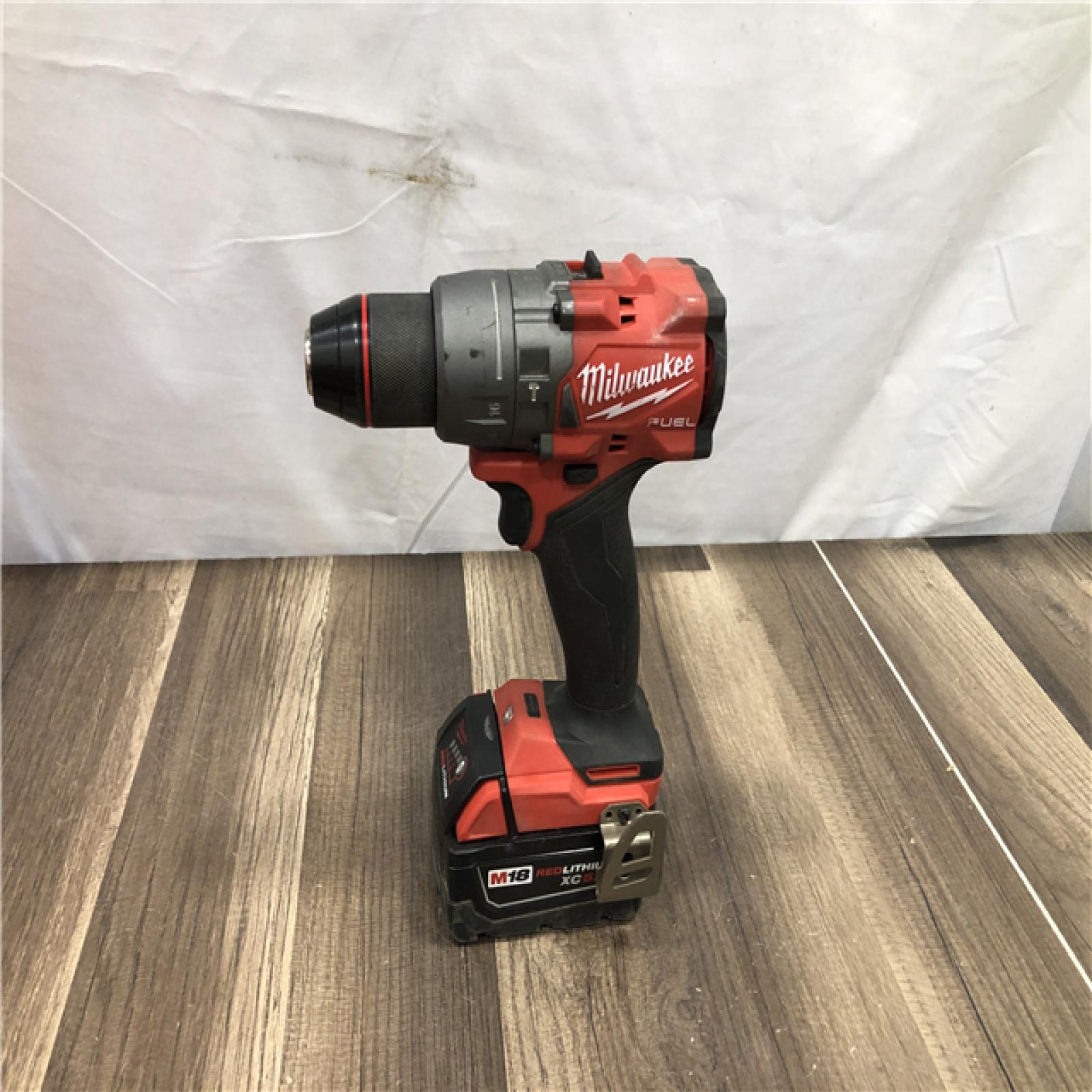 AS-IS Milwaukee FUEL 18V Lithium-Ion Brushless Cordless 1/2 in. Hammer Drill Driver Kit