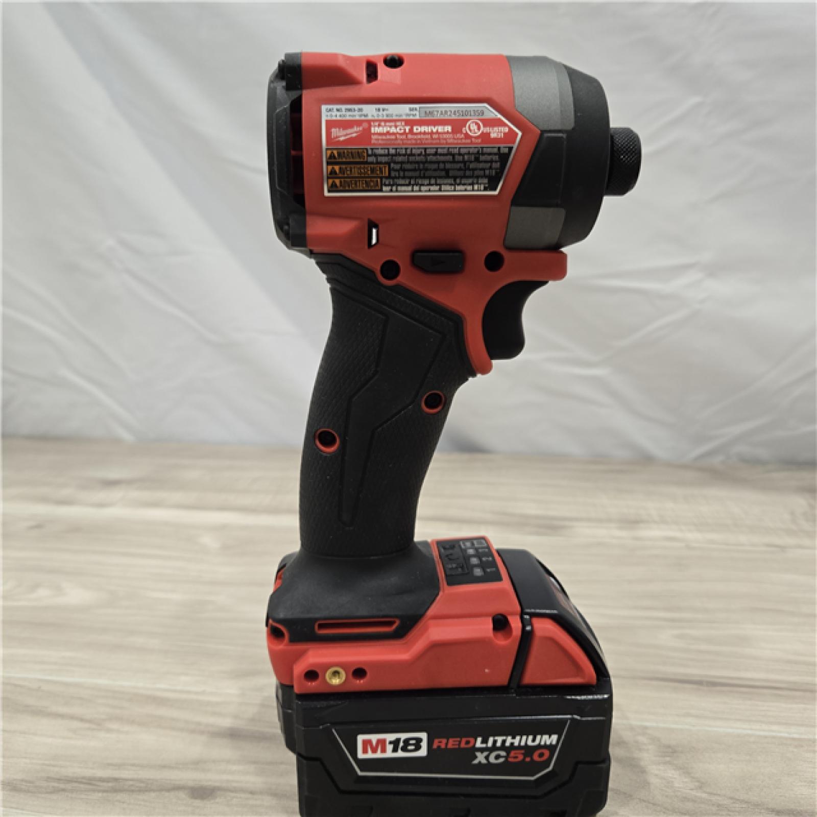 AS-IS MILWAUKEE FUEL 18V Lithium-Ion Brushless Cordless Hammer Drill and Impact Driver Combo Kit (2-Tool) with 2 Batteries