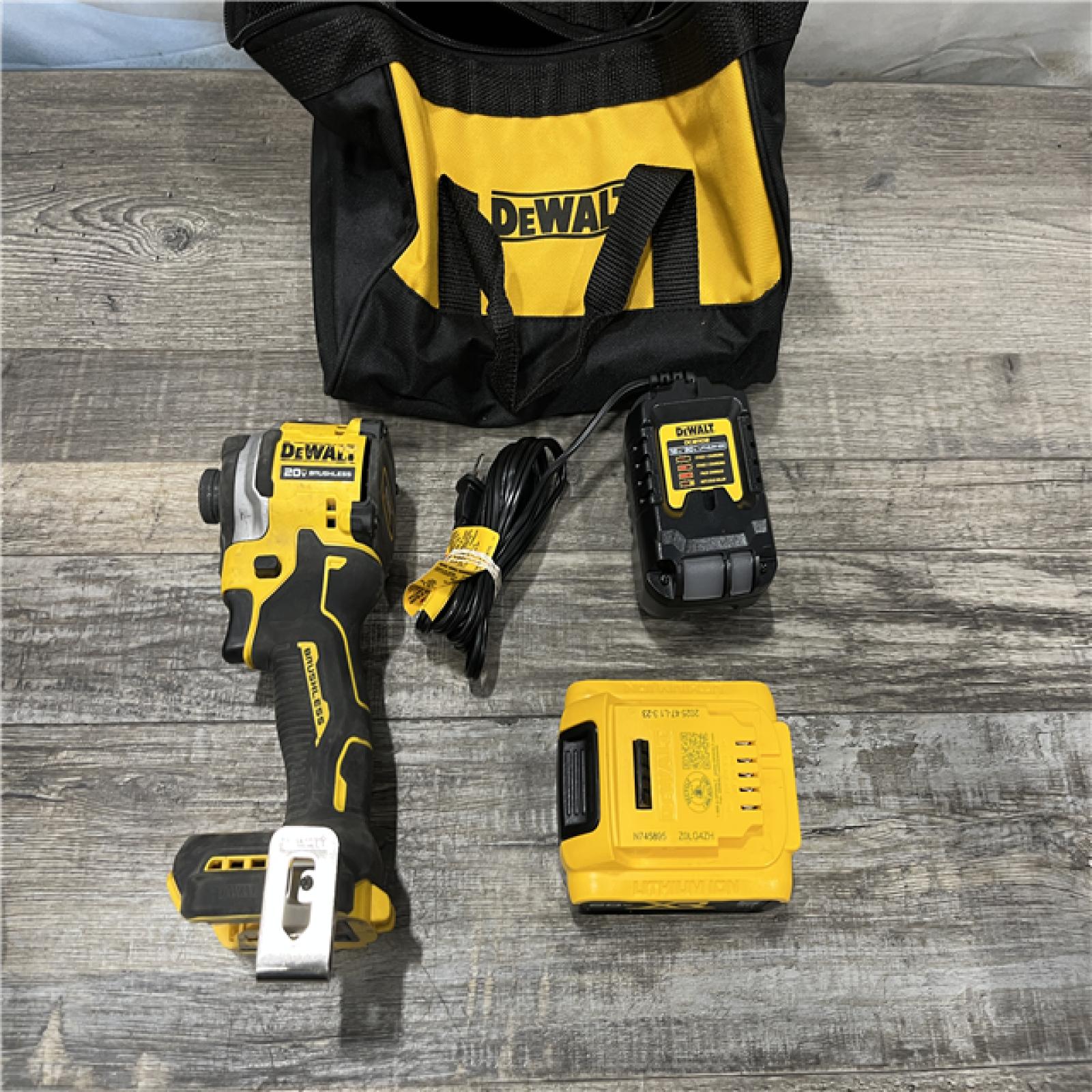 AS-IS DEWALT ATOMIC 20V MAX Lithium-Ion Cordless 1/4 in. Brushless Impact Driver Kit