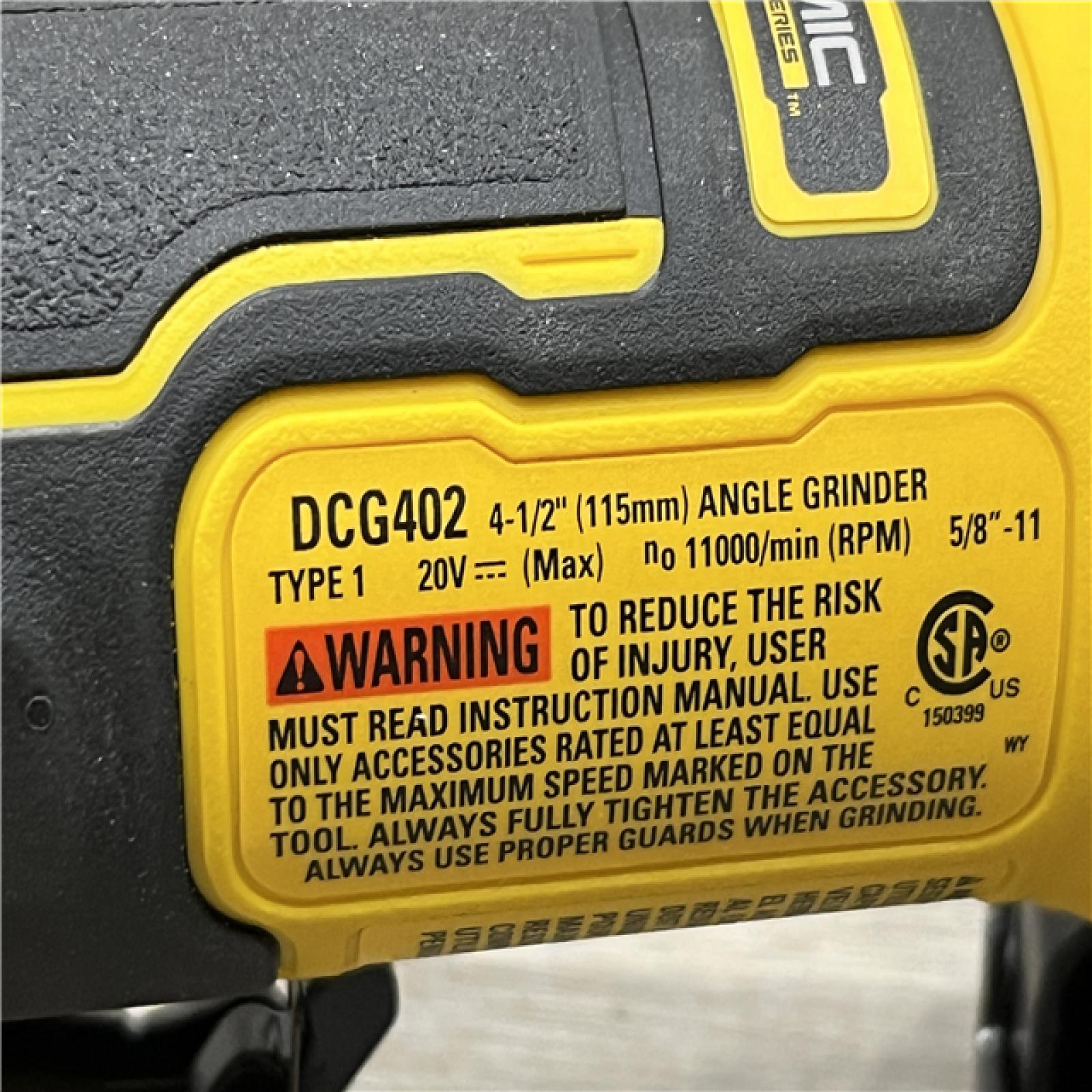 AS-IS DEWALT ATOMIC 20V MAX Cordless 4-1/2 in. Angle Grinder with Paddle Switch (Tool Only)