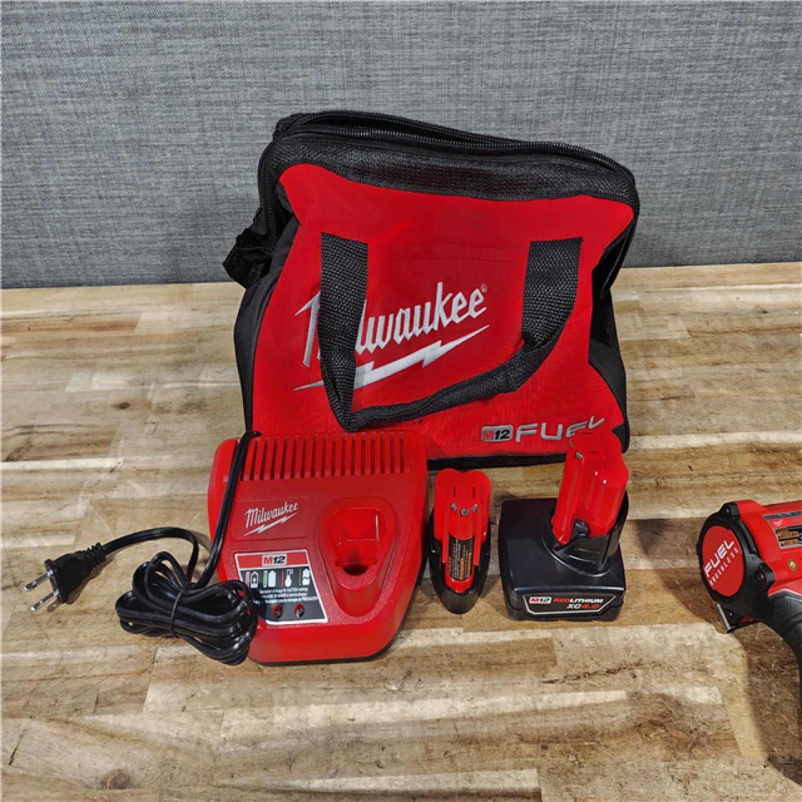 HOUSTON LOCATION - AS - IS Milwaukee FUEL 12V Lithium-Ion Brushless Cordless 1/4 in. Hex Impact Driver Kit