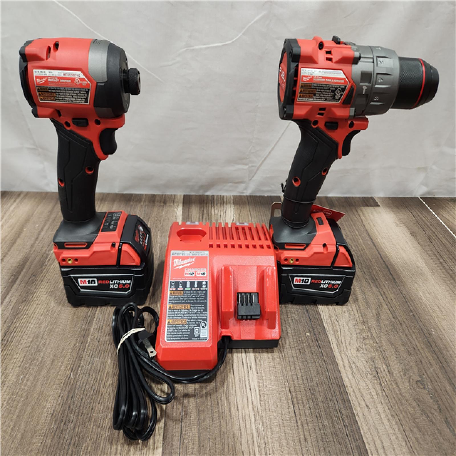 AS-IS- MILWAUKEE FUEL 18V Lithium-Ion Brushless Cordless Hammer Drill and Impact Driver Combo Kit