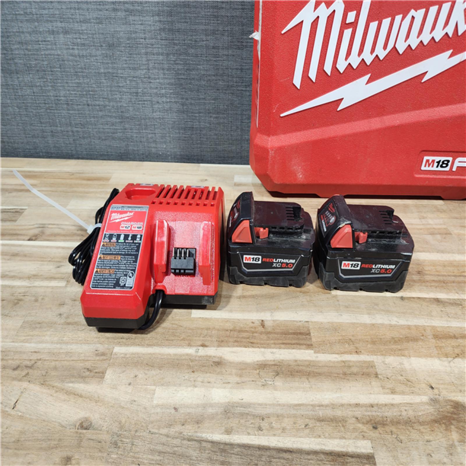 HOUSTON LOCATION - AS-IS Milwaukee FUEL 18V Lithium-Ion Brushless Cordless Hammer Drill and Impact Driver Combo Kit