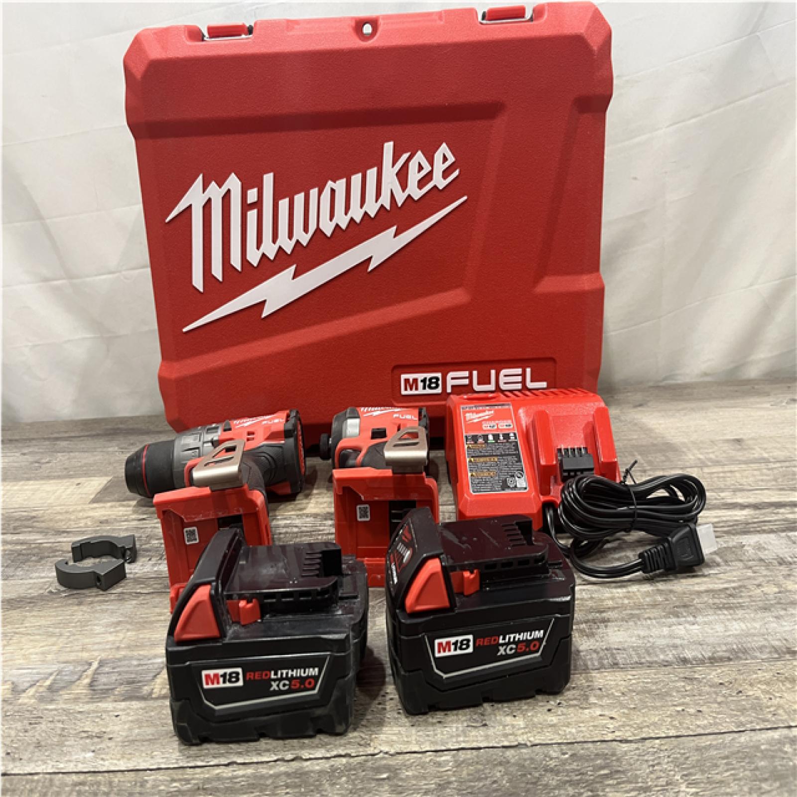 AS-IS Milwaukee FUEL 18V Lithium-Ion Brushless Cordless Hammer Drill and Impact Driver Combo Kit