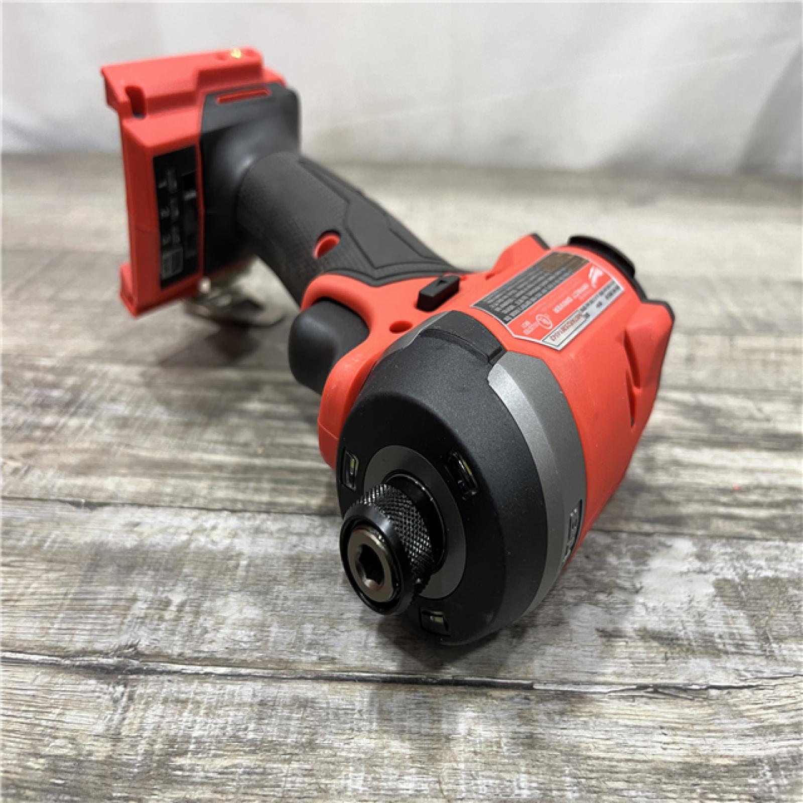 AS-IS Milwaukee FUEL 18V Lithium-Ion Brushless Cordless 1/4 in. Hex Impact Driver (Tool-Only)