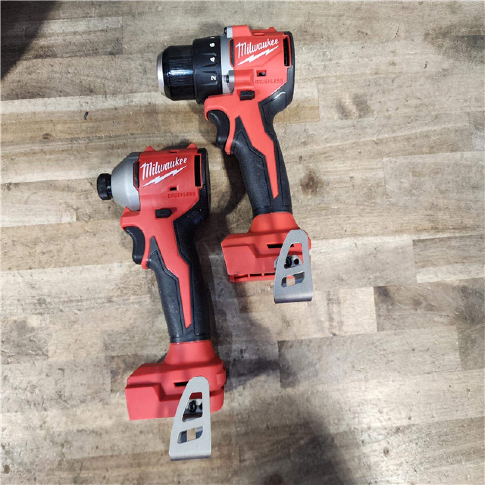 HOUSTON LOCATION - AS-IS Milwaukee M18 18V Lithium-Ion Brushless Cordless Compact Drill/Impact Combo Kit (2-Tool) W/(2) 2.0 Ah Batteries  Charger & Bag