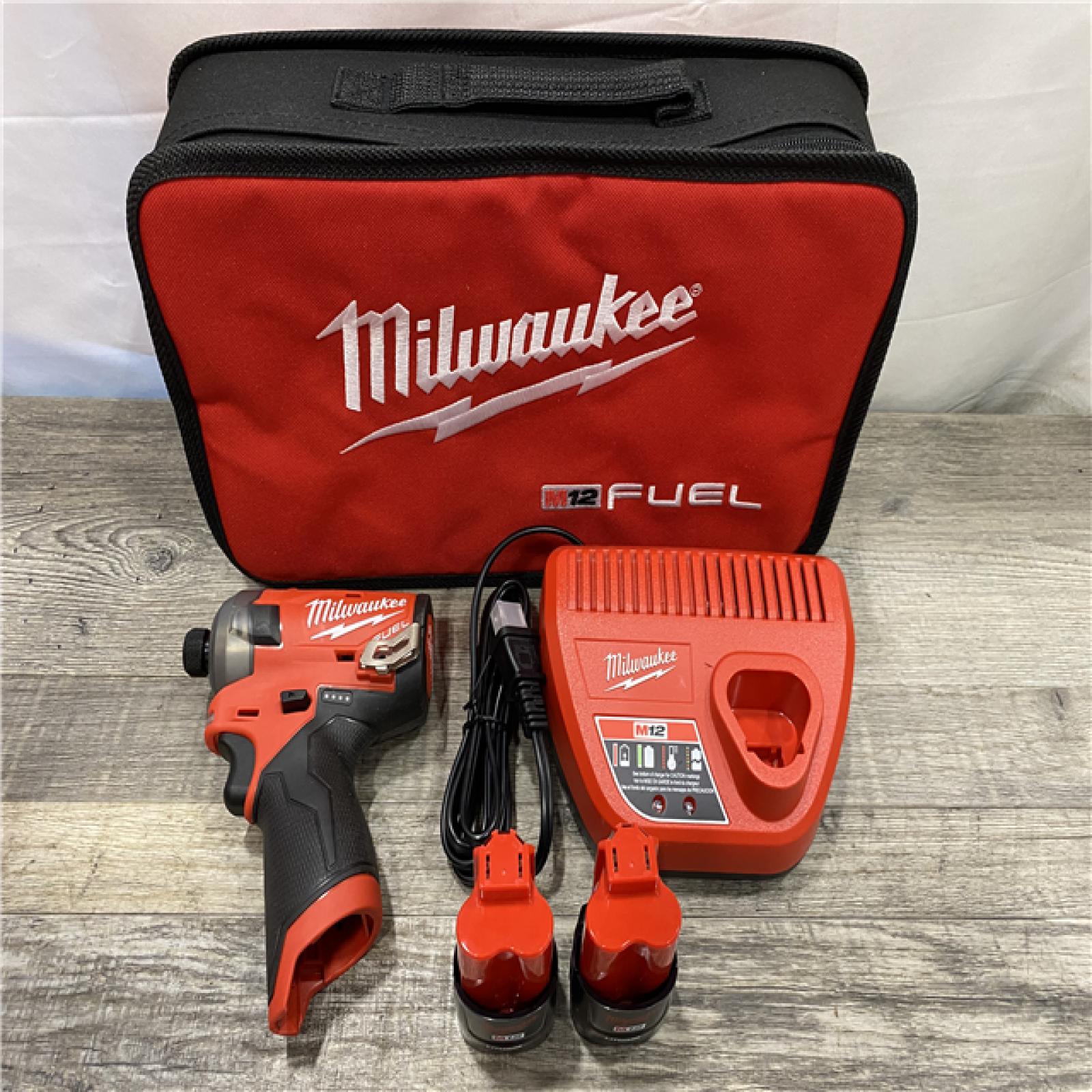 AS-IS Milwaukee FUEL SURGE 12V Lithium-Ion Brushless Cordless 1/4 in. Hex Impact Driver Compact Kit