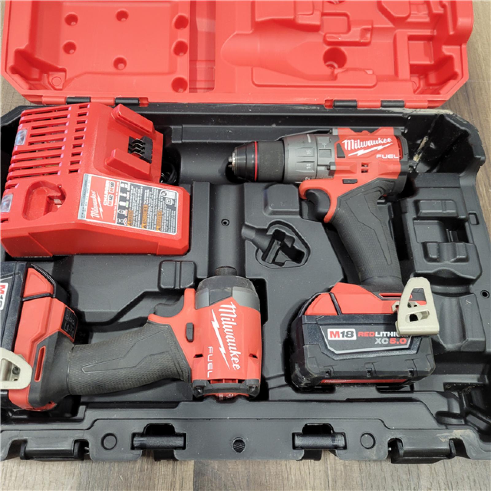 AS-IS MILWAUKEE M18 FUEL 18V Lithium-Ion Brushless Cordless Hammer Drill and Impact Driver Combo Kit (2-Tool) with 2 Batteries
