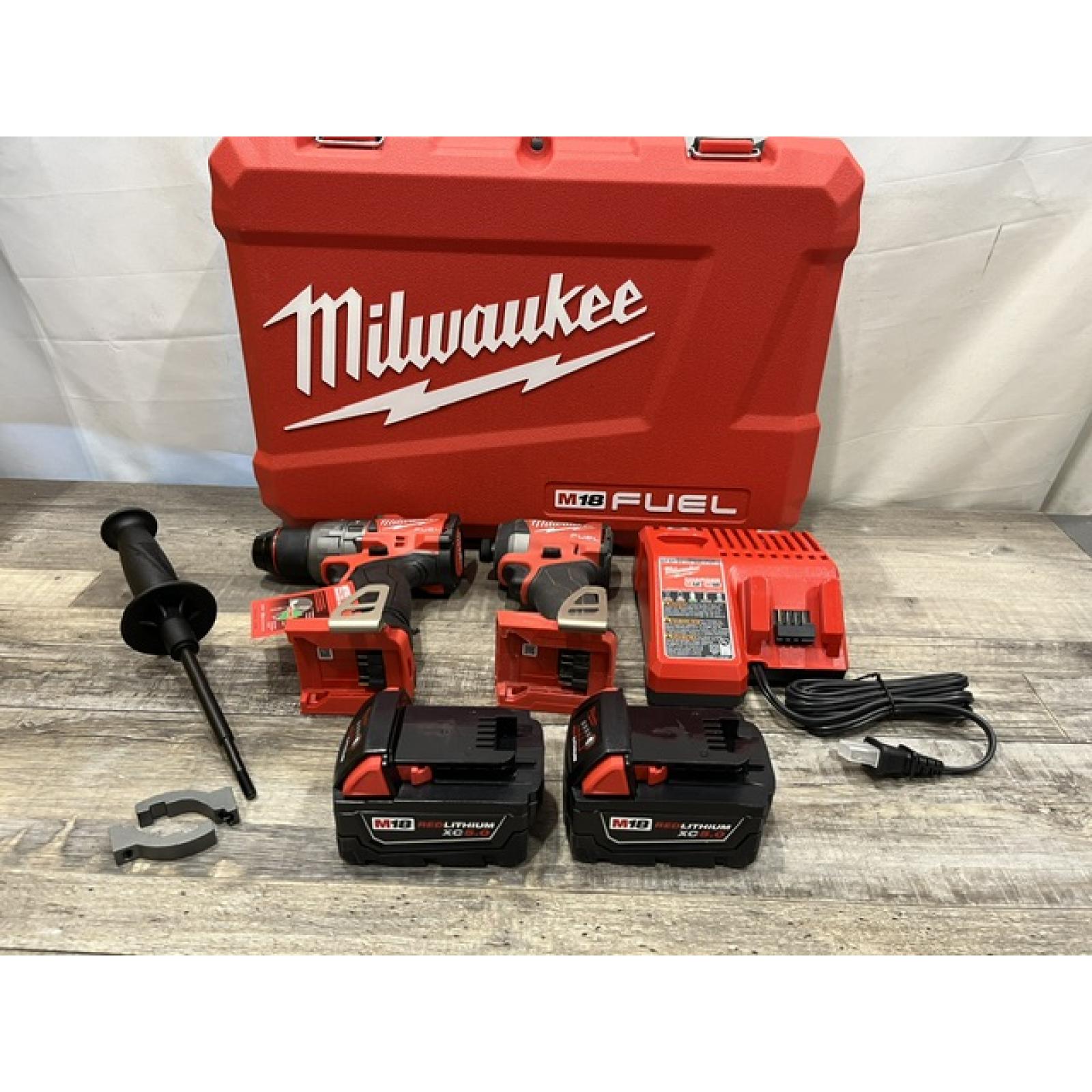 AS-IS Milwaukee FUEL 18V Lithium-Ion Brushless Cordless Hammer Drill and Impact Driver Combo Kit