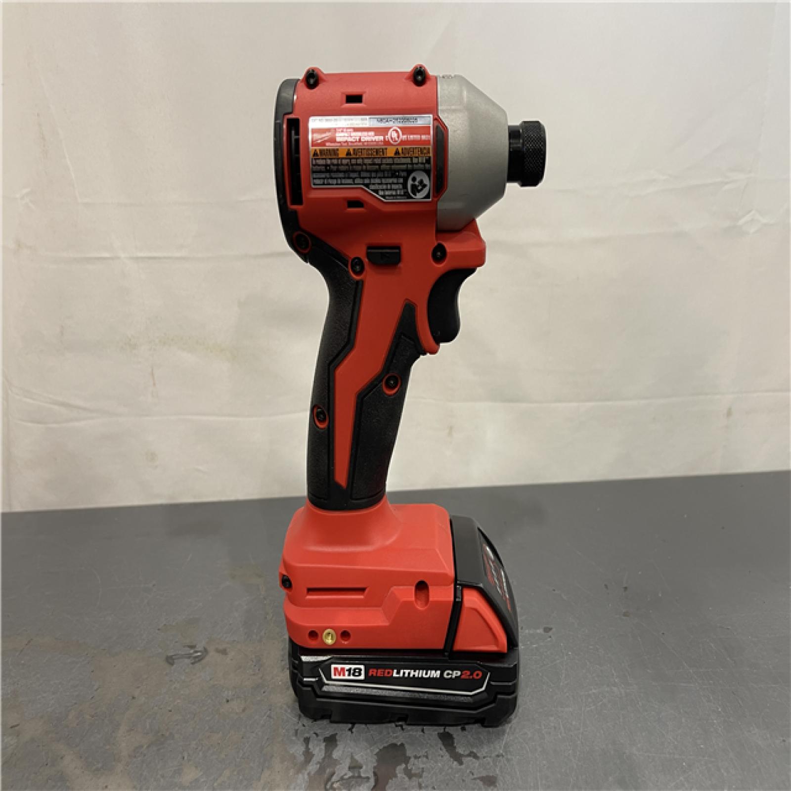 AS-IS - Milwaukee M18 18-Volt Lithium-Ion Compact Brushless Cordless 1/4 in. Impact Driver Kit