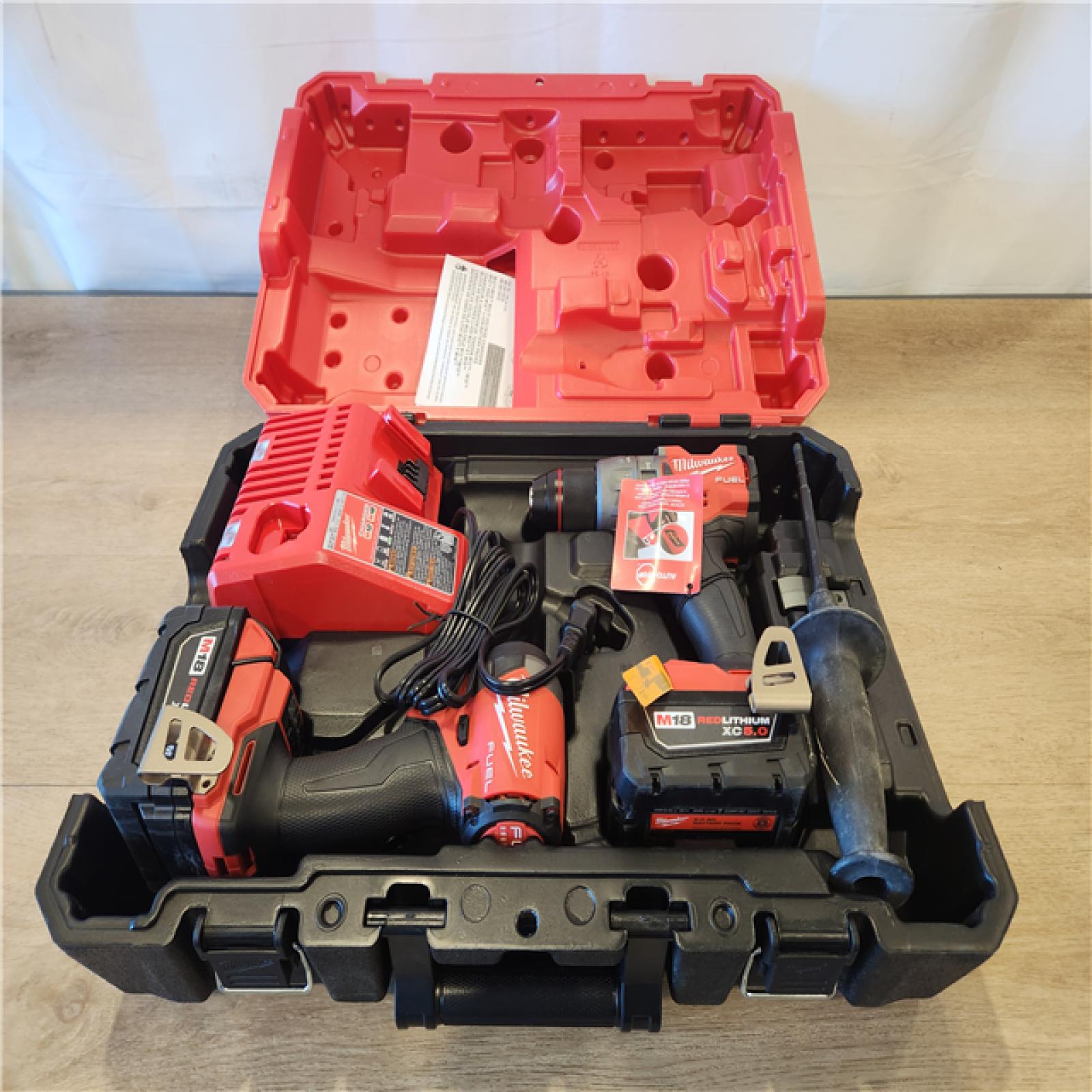 AS-IS- Milwaukee FUEL 18V Lithium-Ion Brushless Cordless Hammer Drill and Impact Driver Combo Kit