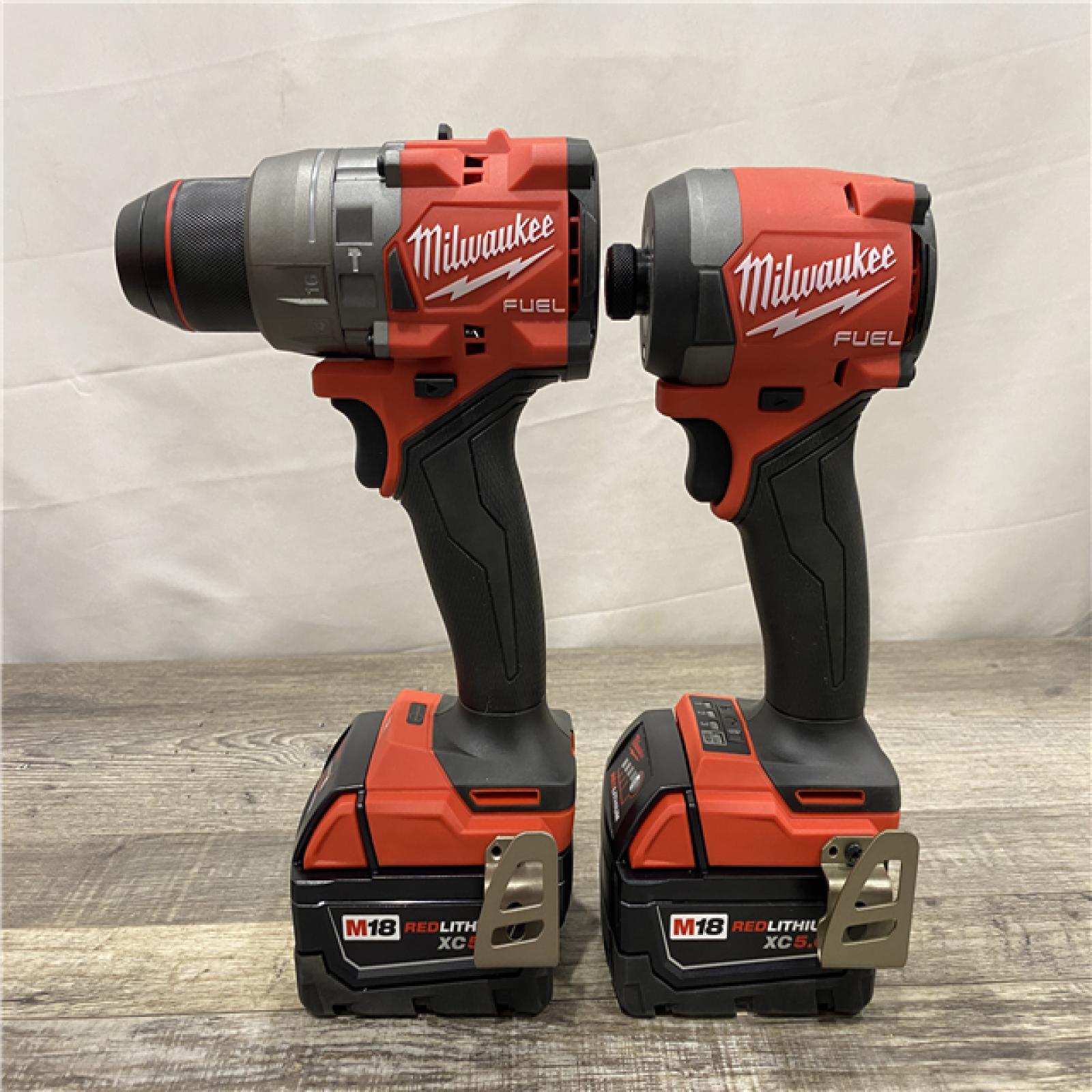AS-IS Milwaukee FUEL 18V Lithium-Ion Brushless Cordless Hammer Drill and Impact Driver Combo Kit