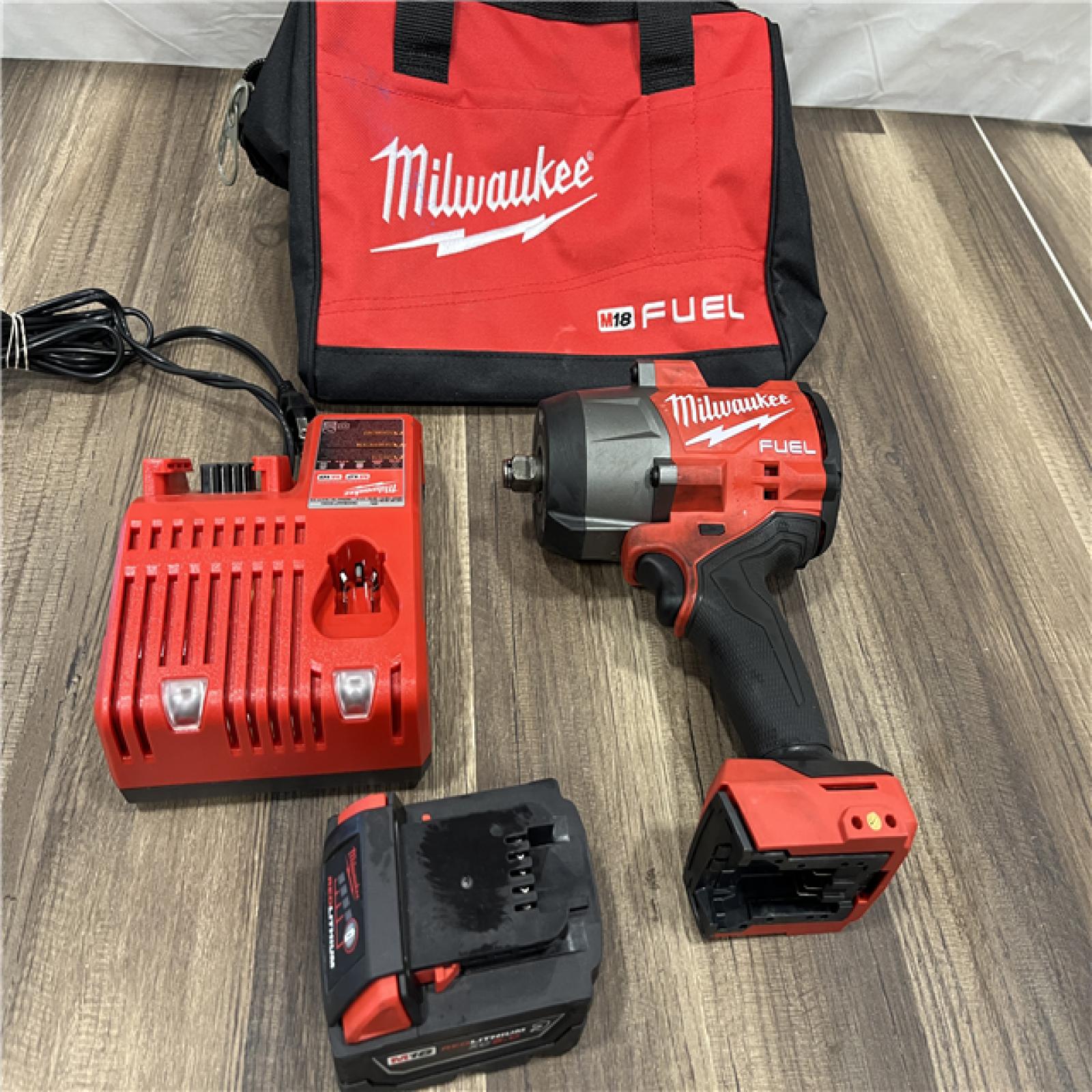 AS-IS Milwaukee 2663-20 1/2  Impact Wrench 48-11-1850 5Ah Battery  48-59-1812 Charger