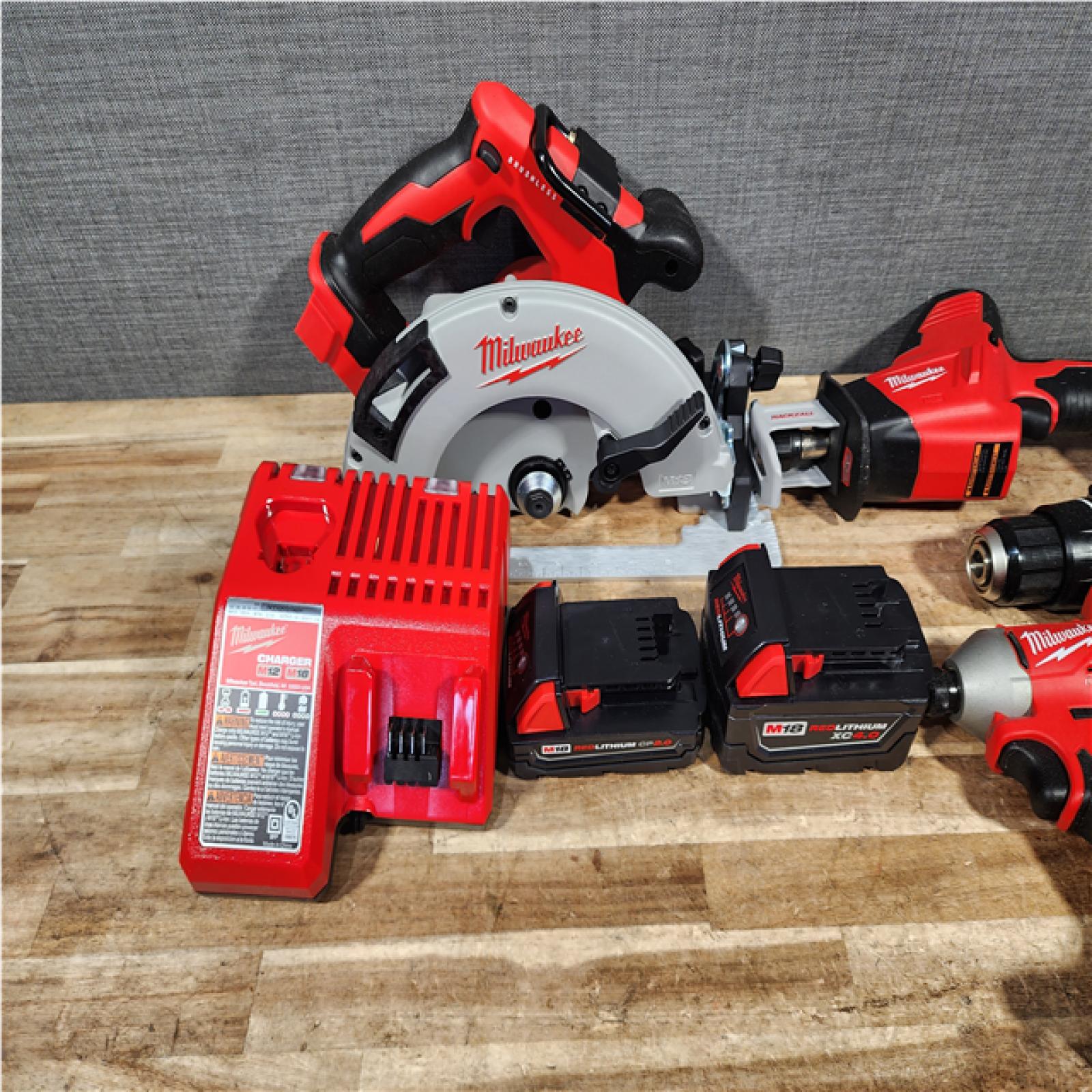 HOUSTON LOCATION - AS - IS Milwaukee 18-Volt Lithium-Ion Brushless Cordless (4-Tool) Combo Kit