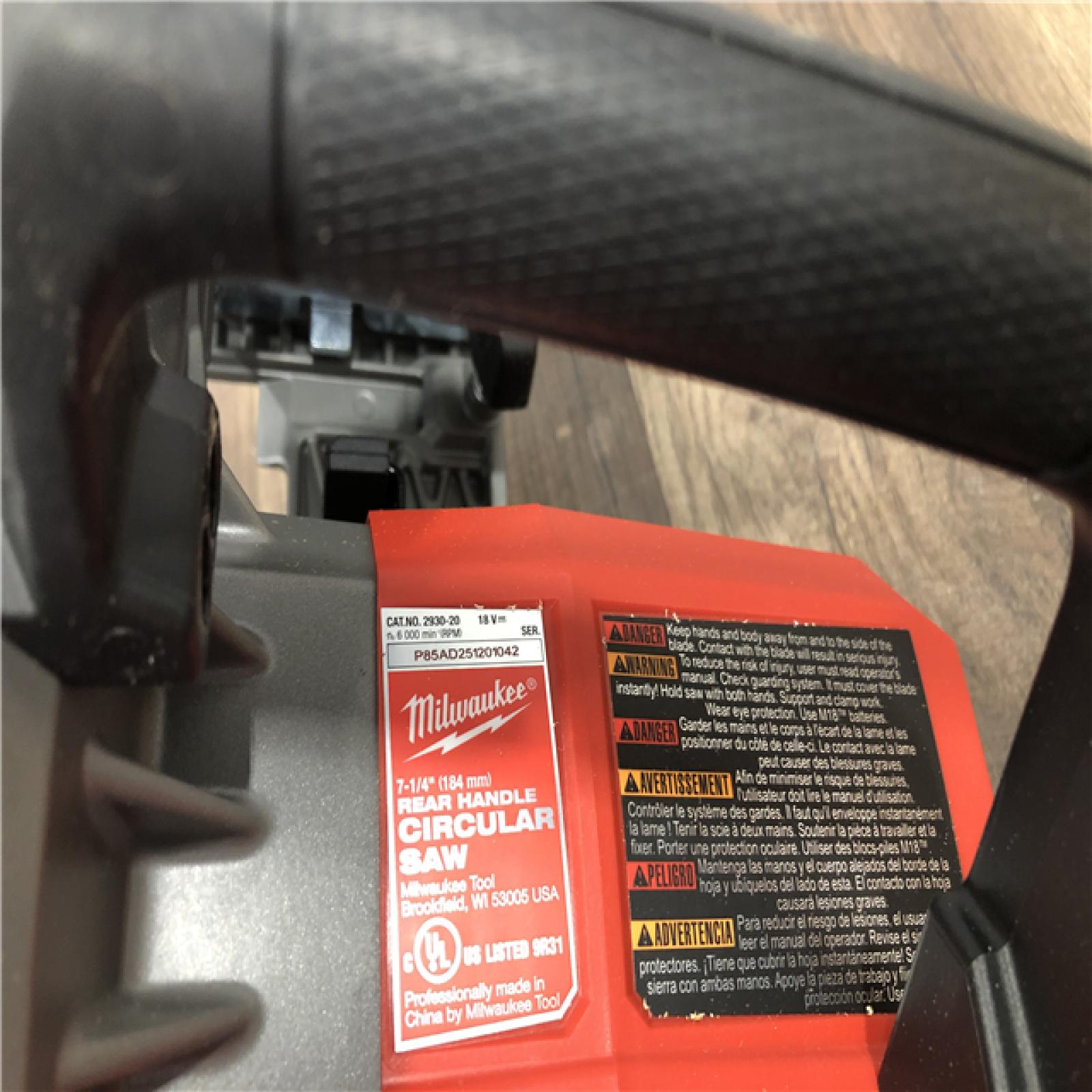 AS-IS Milwaukee FUEL 18V Lithium-Ion Cordless 7-1/4 in. Rear Handle Circular Saw (Tool-Only)