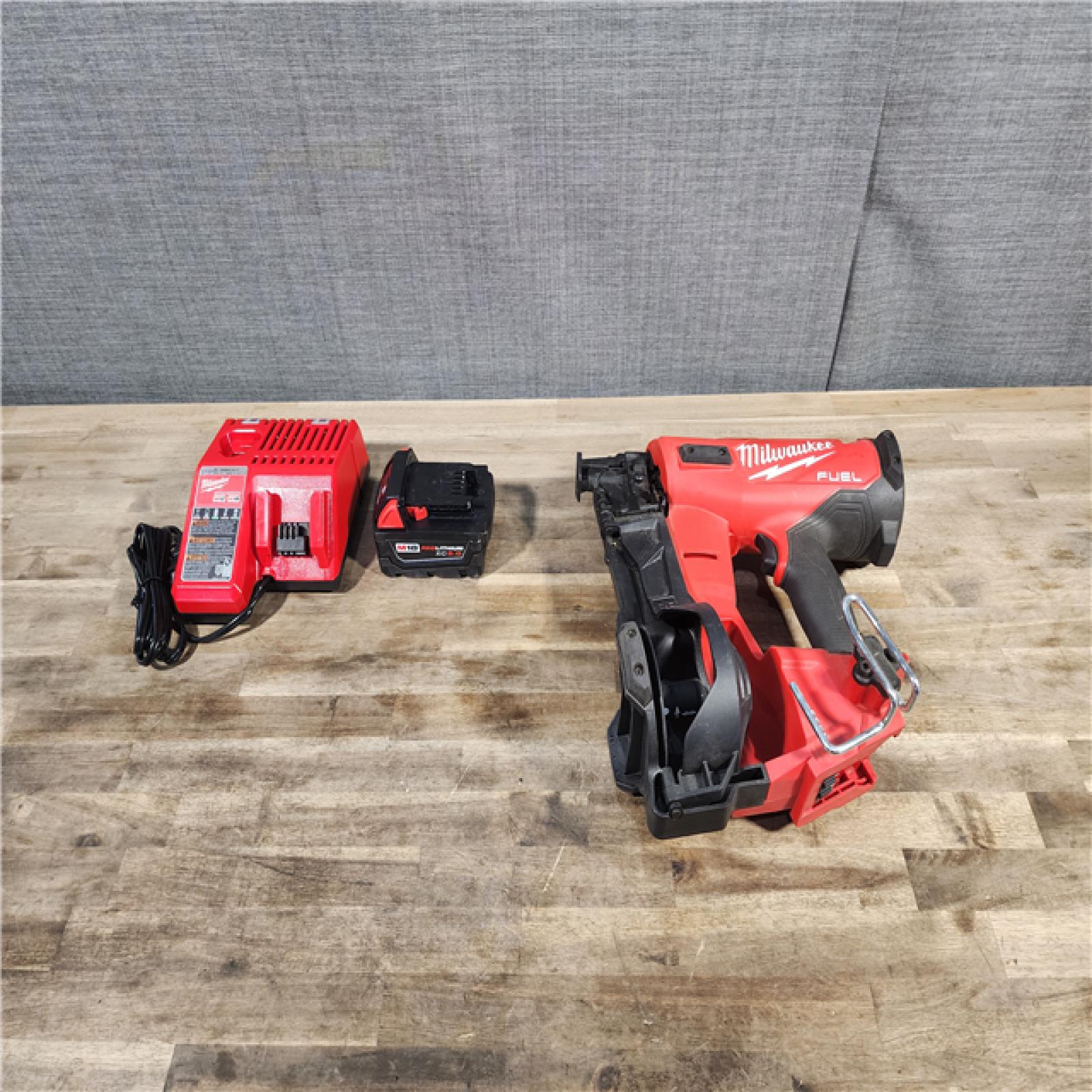 HOUSTON LOCATION - AS-IS M18 FUEL 18-Volt Lithium-Ion Brushless Cordless Coil Roofing Nailer Combo Kit with (1) 5.0 AH BATTERY & CHARGER