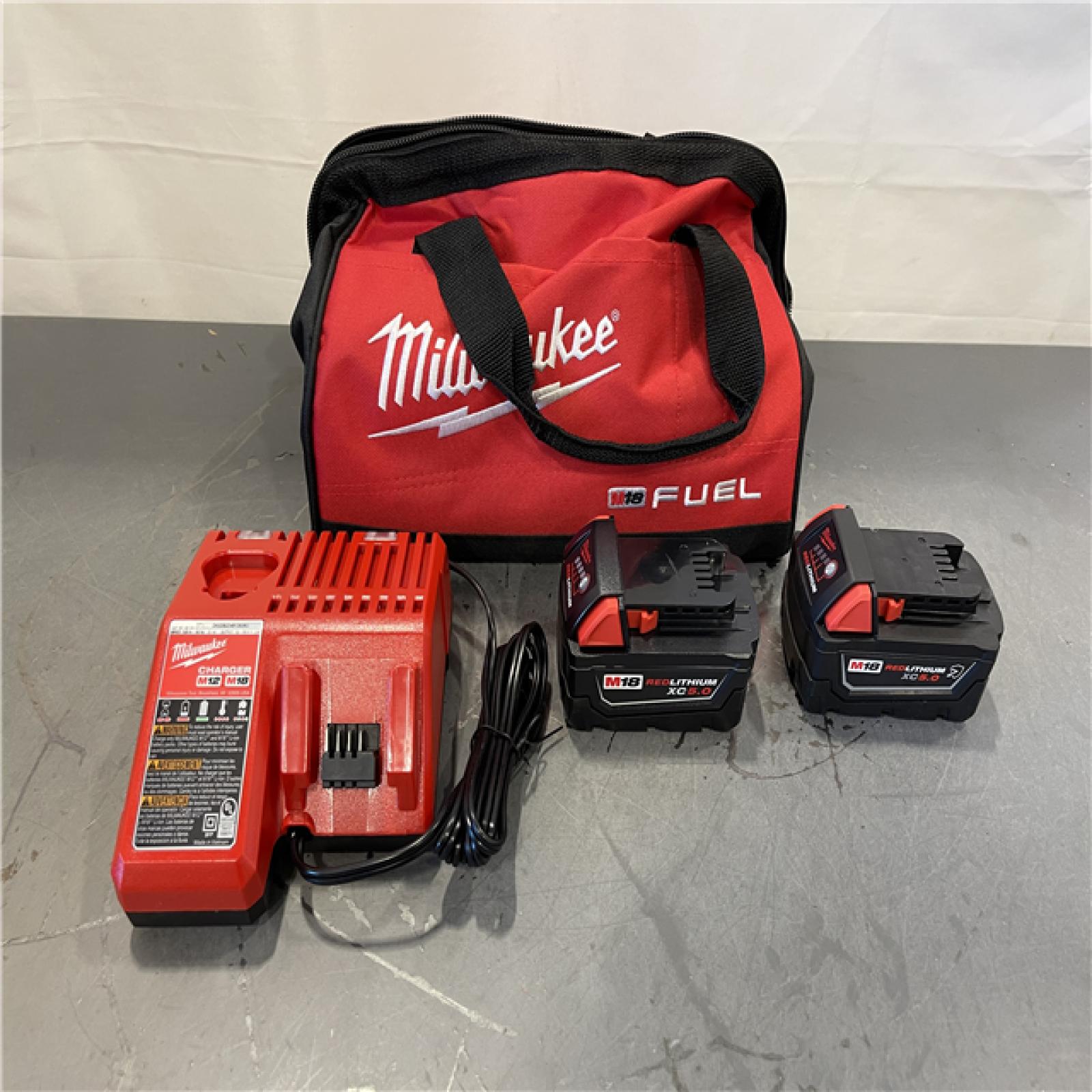 AS-IS - Milwaukee M18 18-Volt Lithium-Ion XC Starter Kit with Two 5.0Ah Batteries and Charger