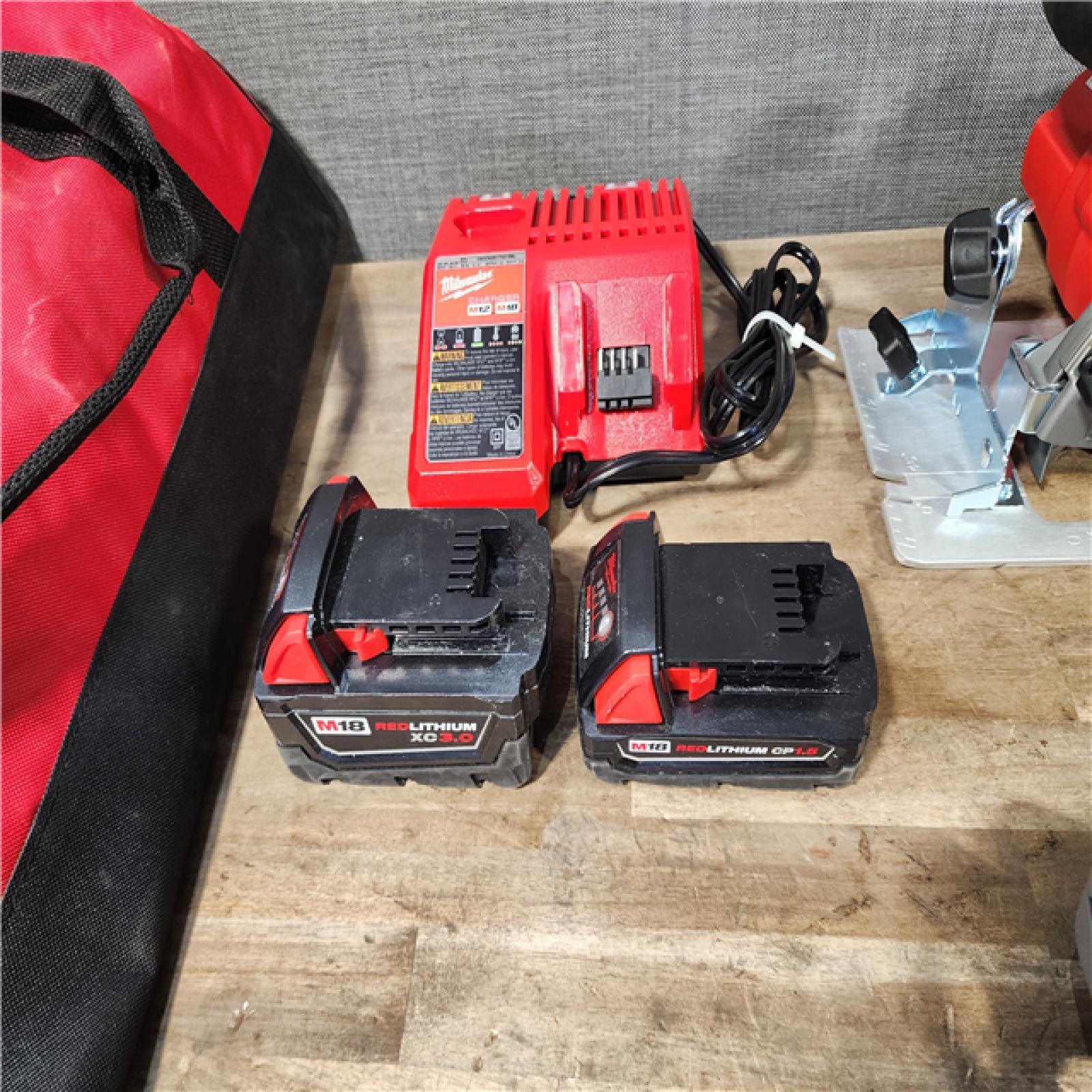 HOUSTON LOCATION - AS-IS M18 18V Lithium-Ion Cordless Combo Kit (5-Tool) with (1) 3.0Ah and (1) 1.5Ah Battery  (1) Charger  (1) Tool Bag