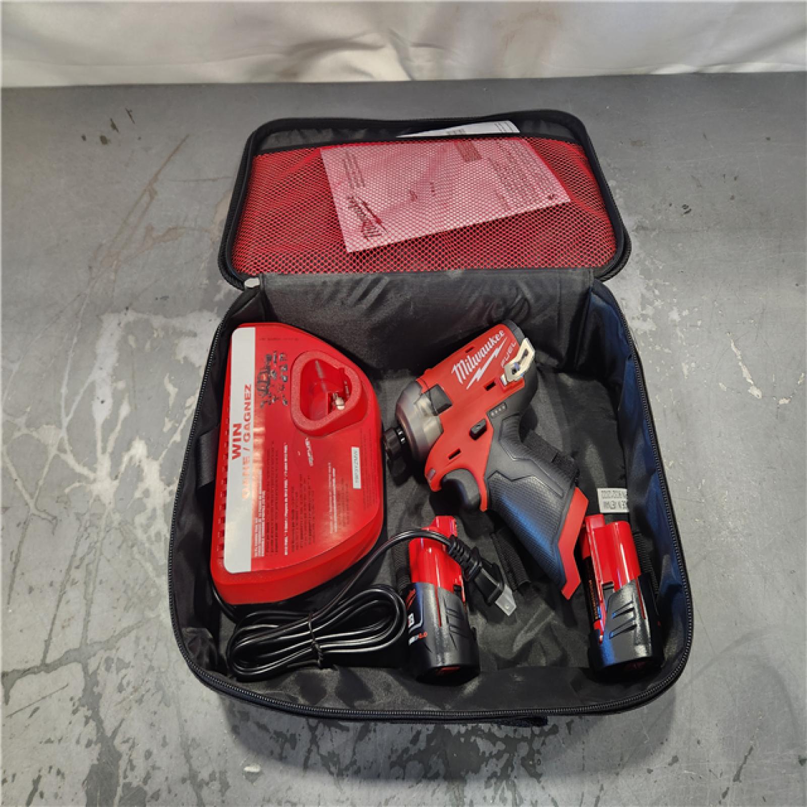 AS-IS- Milwaukee  FUEL SURGE 12V Lithium-Ion Brushless Cordless 1/4 in. Hex Impact Driver Compact Kit