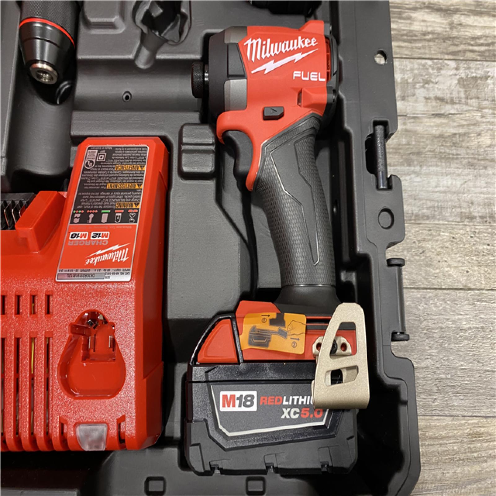 AS-IS Milwaukee FUEL 18V Lithium-Ion Brushless Cordless Hammer Drill and Impact Driver Combo Kit