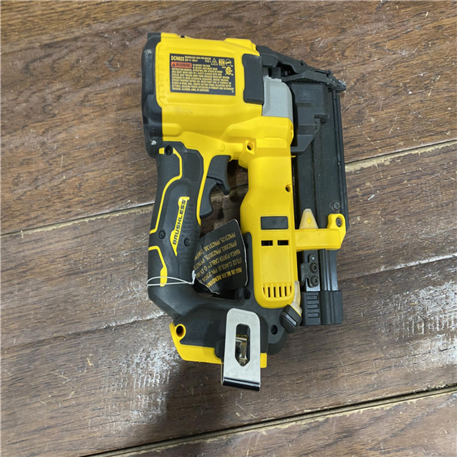 AS-IS DEWALT ATOMIC 20V MAX Lithium Ion Cordless 23 Gauge Pin Nailer Kit with 3.0Ah Battery and Charger