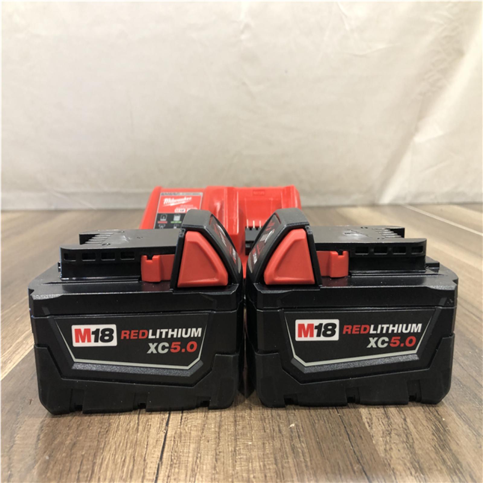 AS-IS Milwaukee 18-Volt Lithium-Ion XC Starter Kit with (2) 5.0Ah Batteries and Charger