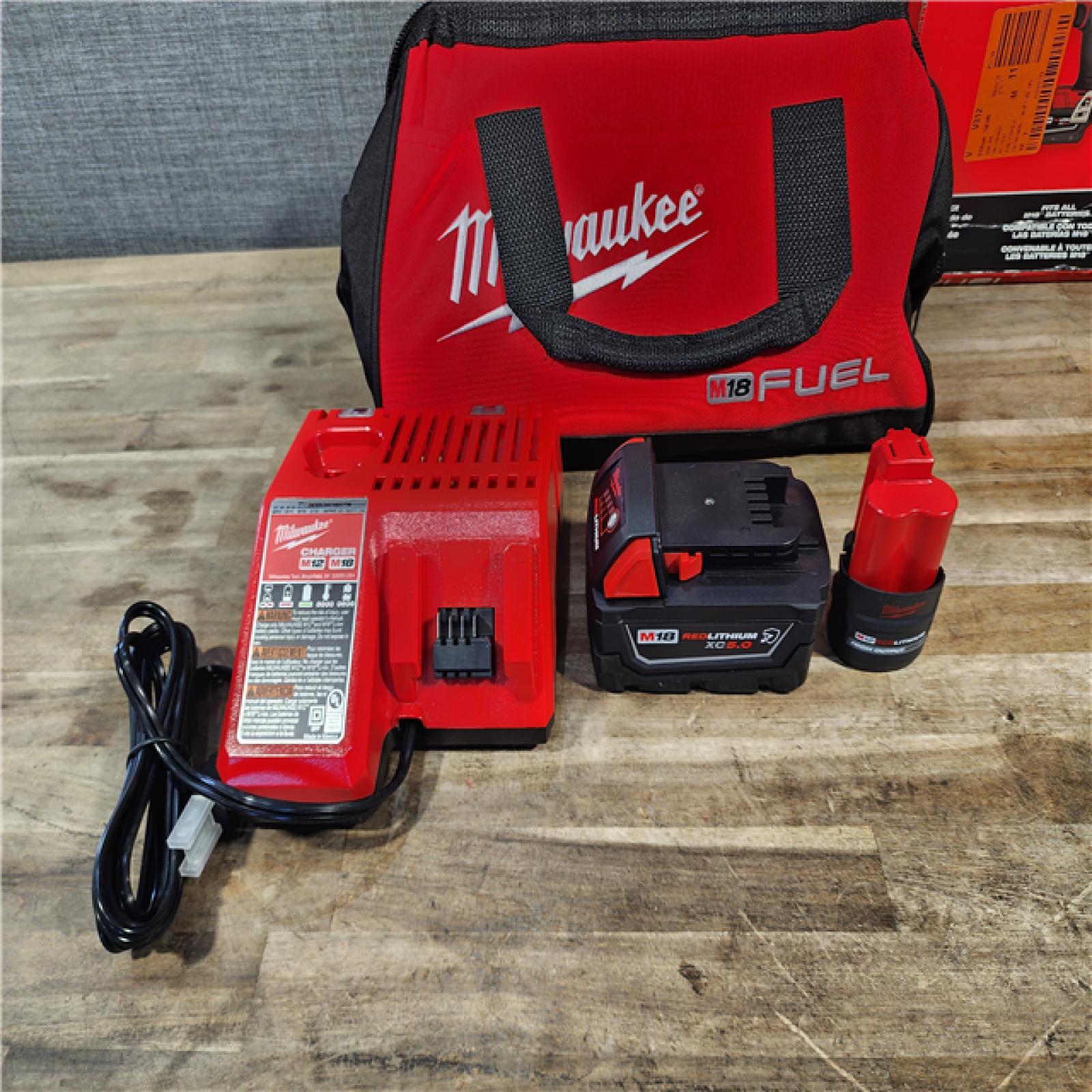 HOUSTON LOCATION - AS-IS (APPEARS LIKE NEW) M18 FUEL 18V Cordless Mid Torque 1/2 in. Impact Wrench W/ M12 FUEL 3/8 in. Ratchet & Battery/Charger Combo Kit