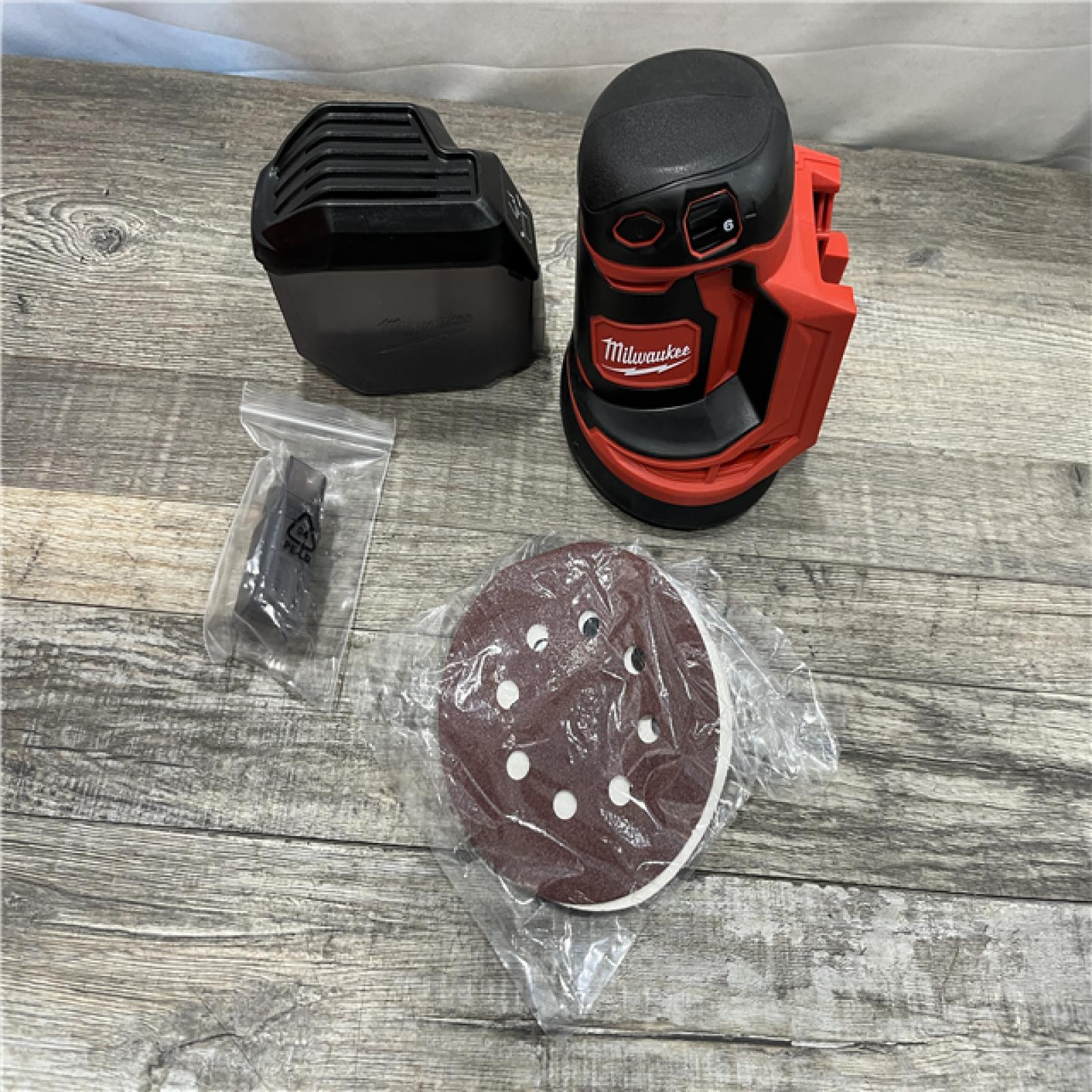 AS-IS Milwaukee 18V Lithium-Ion Cordless 5 in. Random Orbit Sander (Tool-Only)