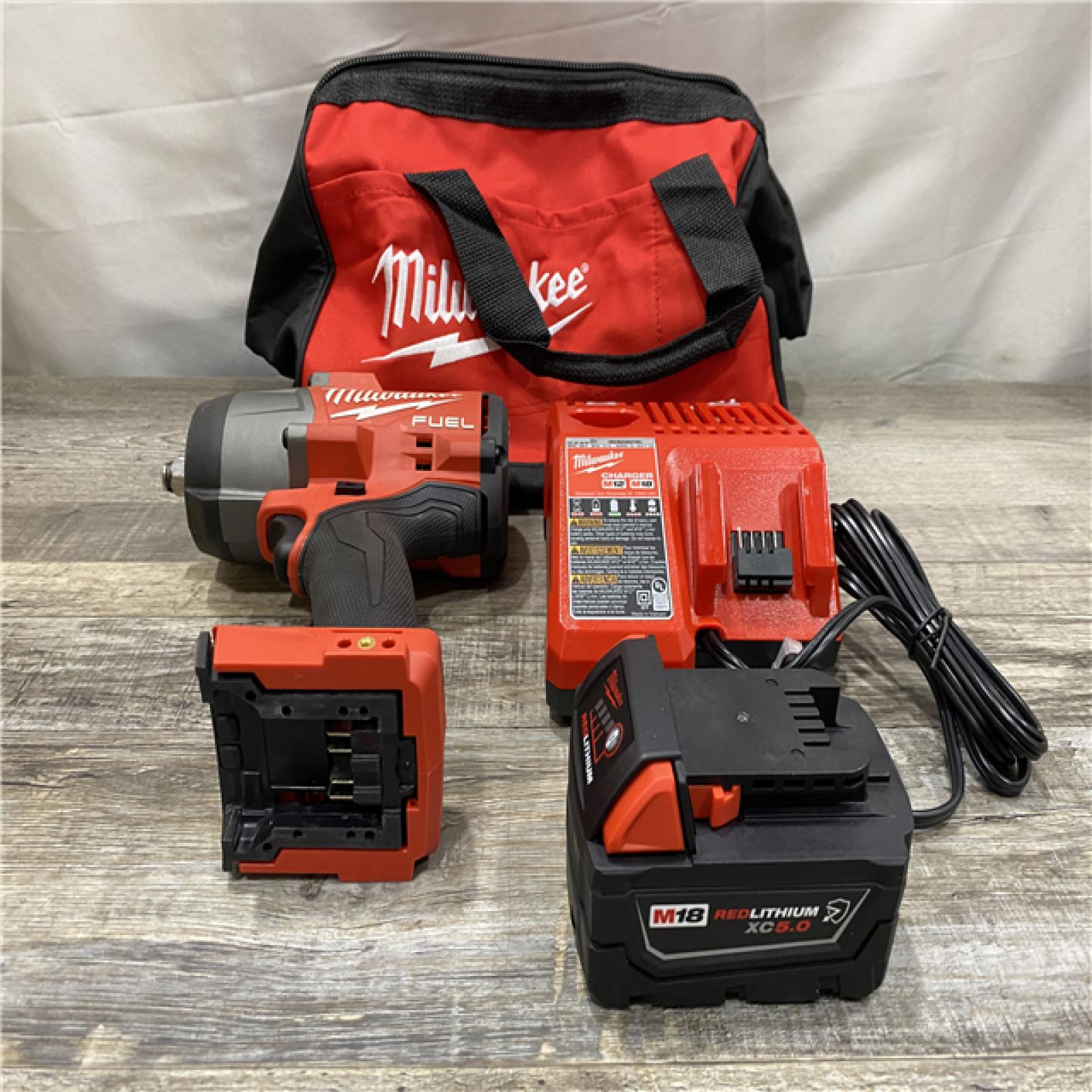 AS-IS Milwaukee FUEL 18V Lithium-Ion Brushless Cordless 1/2 in. Impact Wrench w/Friction Ring Kit