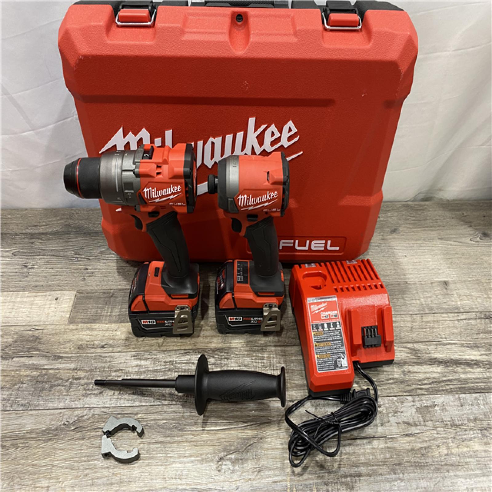 AS-IS Milwaukee FUEL 18V Lithium-Ion Brushless Cordless Hammer Drill and Impact Driver Combo Kit
